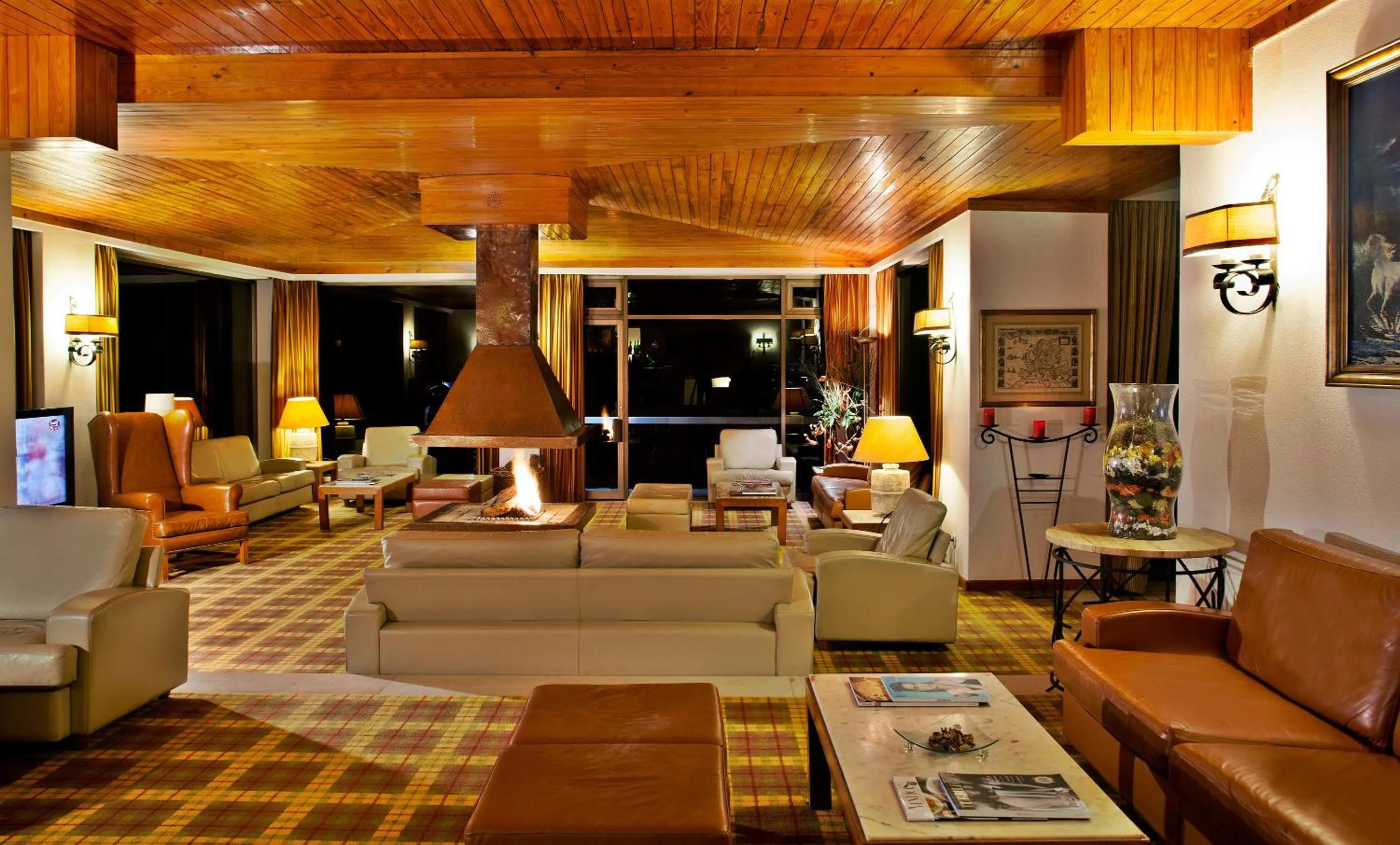 Communal lounge/ TV room in Lago Azul Eco Hotel