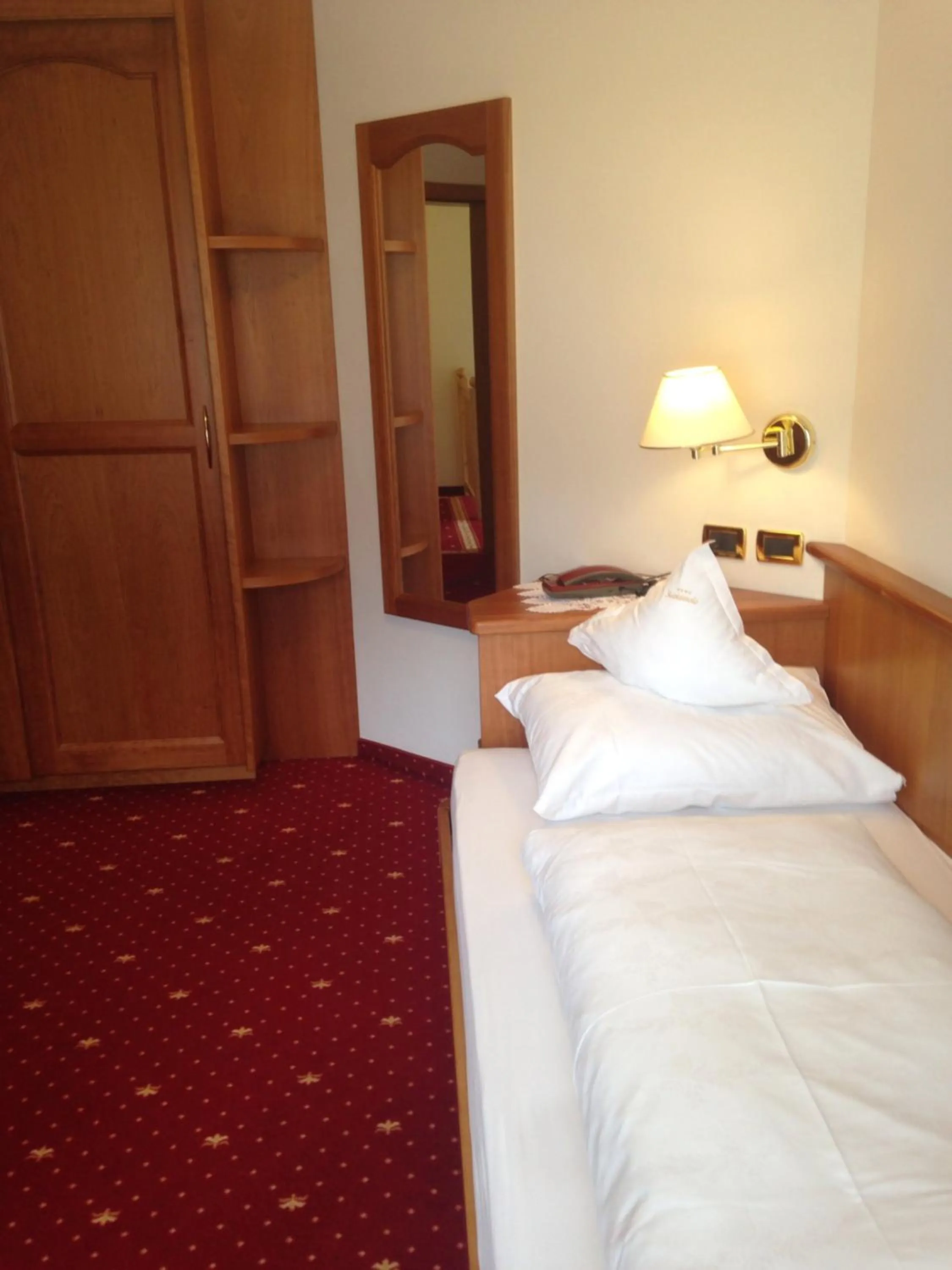 Bed in Hotel Scoiattolo