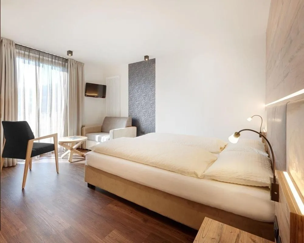 Bed in Hotel Al Cervo