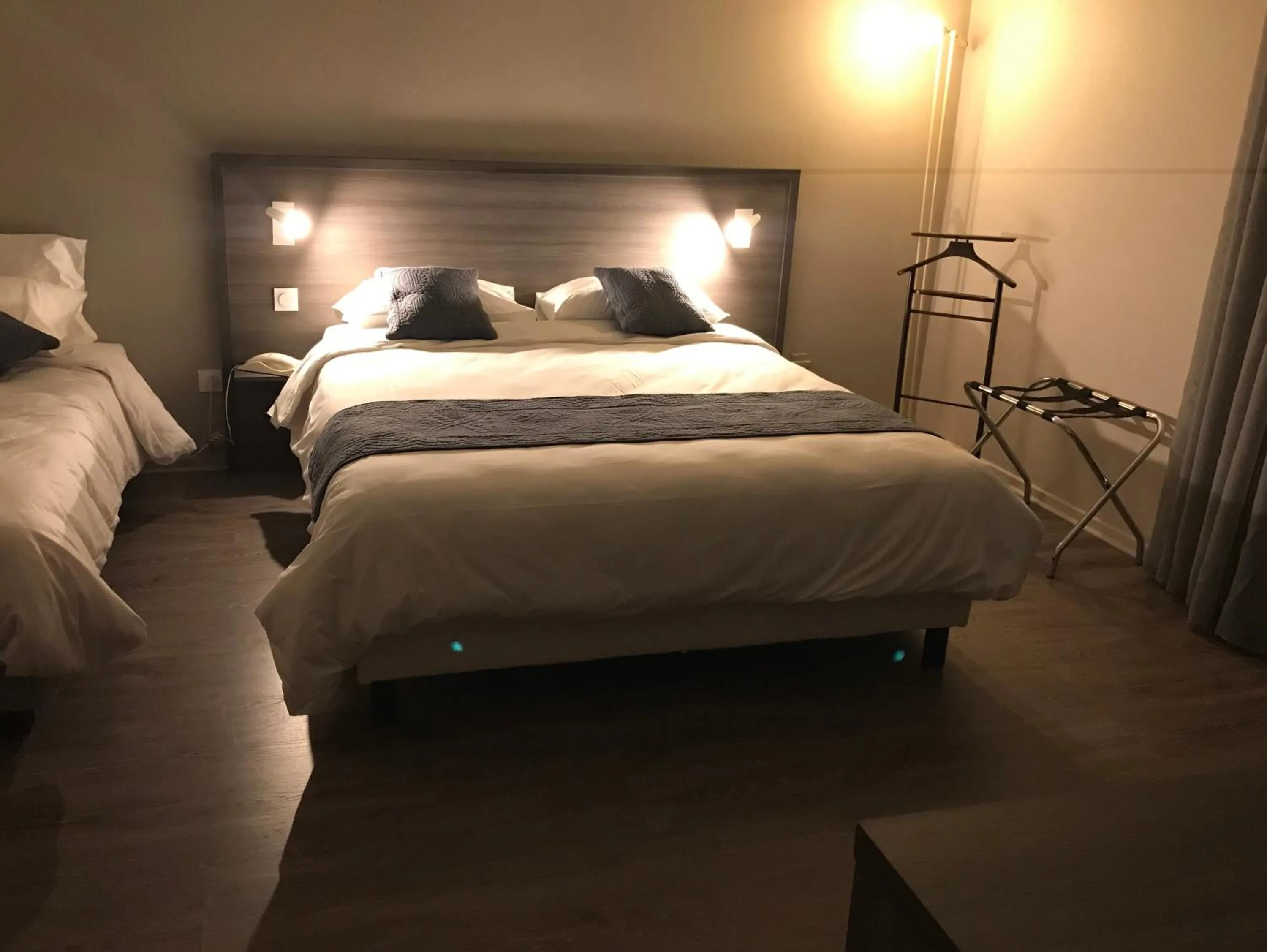 Photo of the whole room, Bed in Hôtel Pyrène