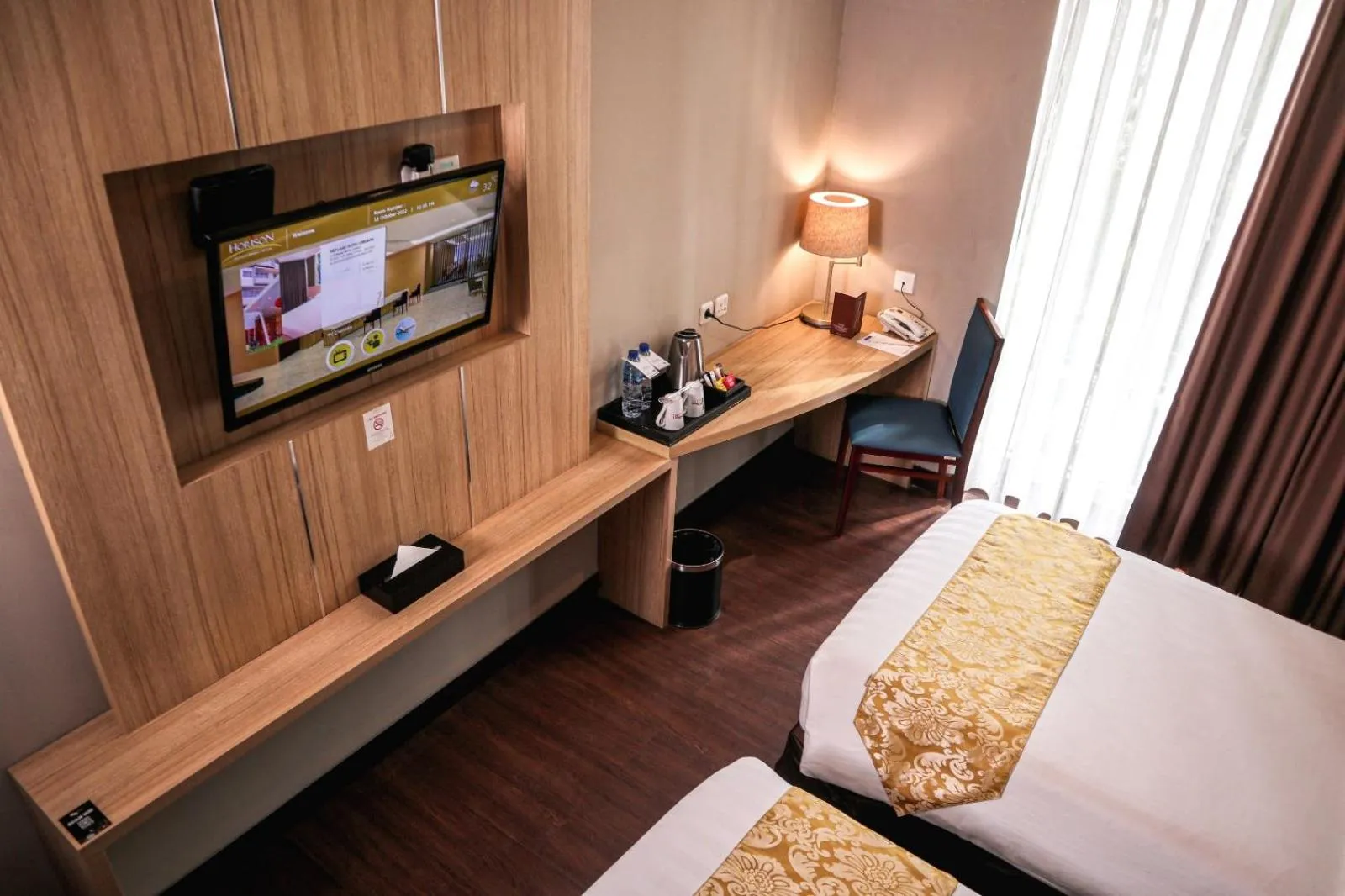 TV and multimedia, Bed in Anara Sky Kualanamu Hotel