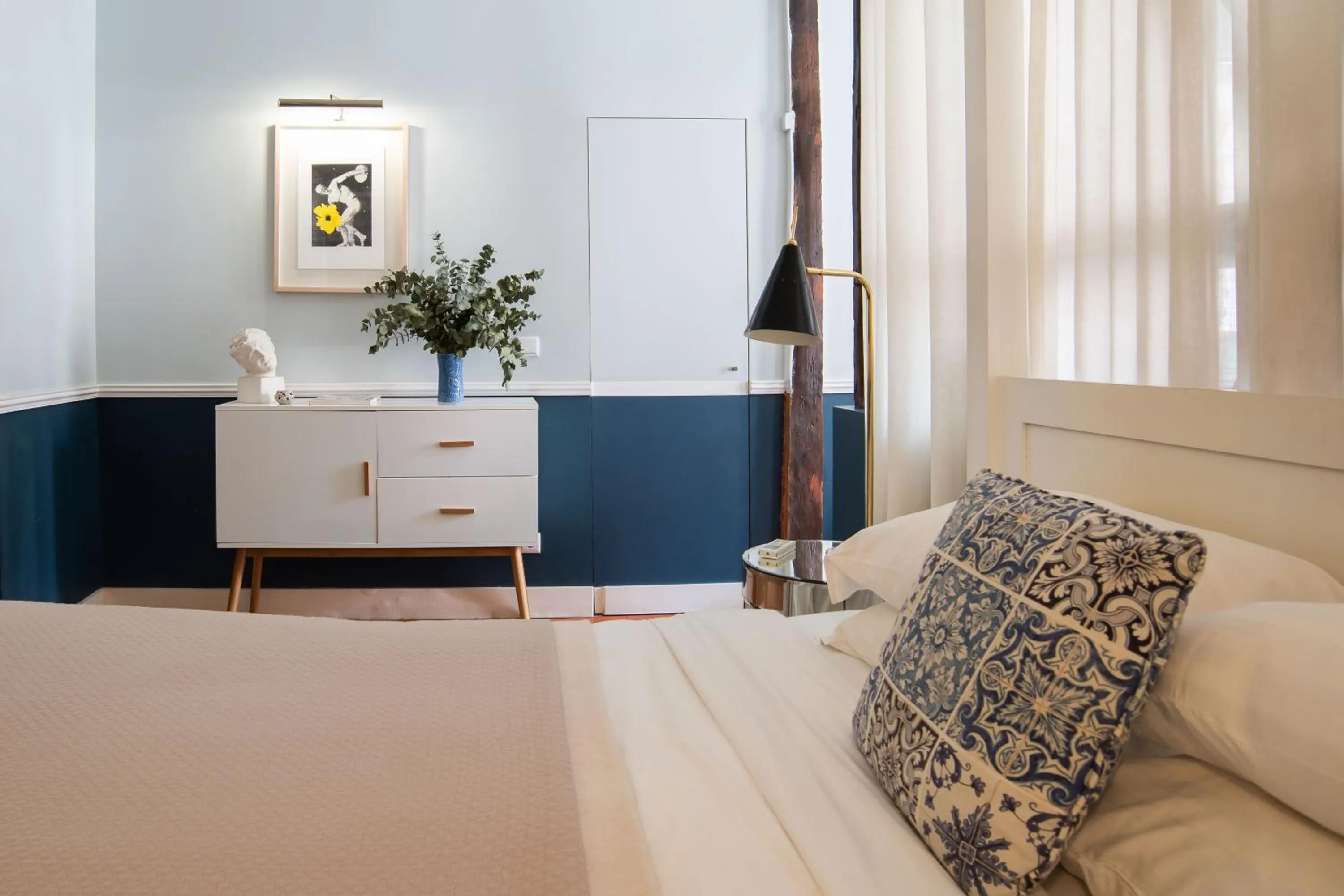 Bed in CASA AMORA Studio Apartments