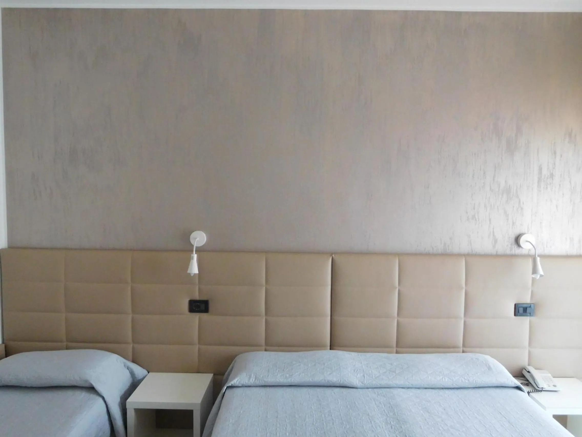 Bed in Hotel Emperador