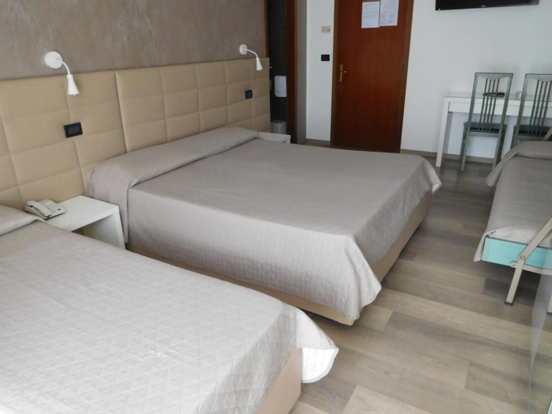 Bed in Hotel Emperador