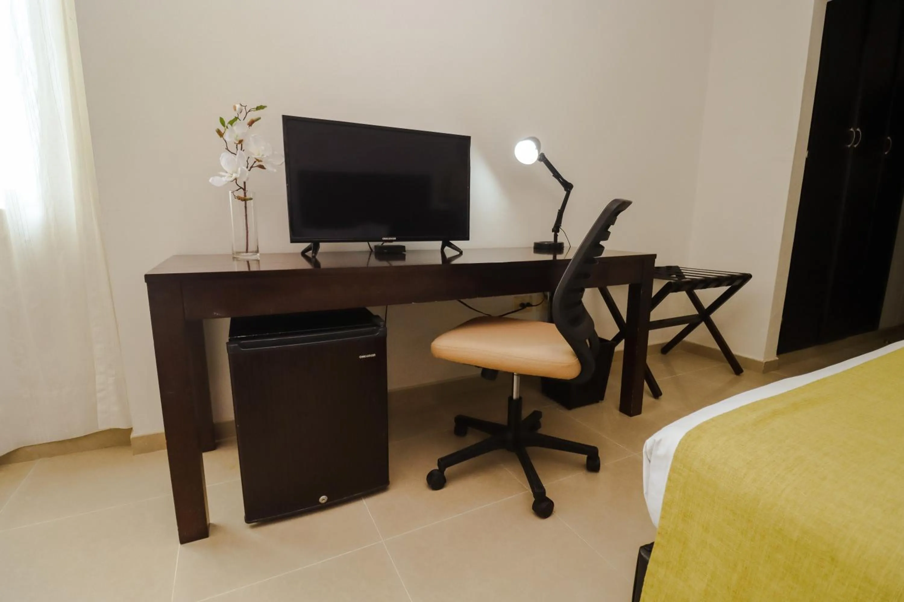 Communal lounge/ TV room in Hotel Millenium Barrancabermeja