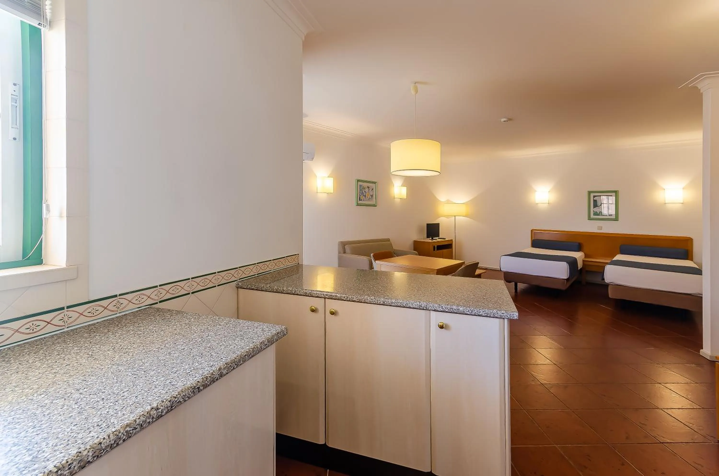 Kitchen or kitchenette, Bed in TURIM Estrela do Vau Hotel