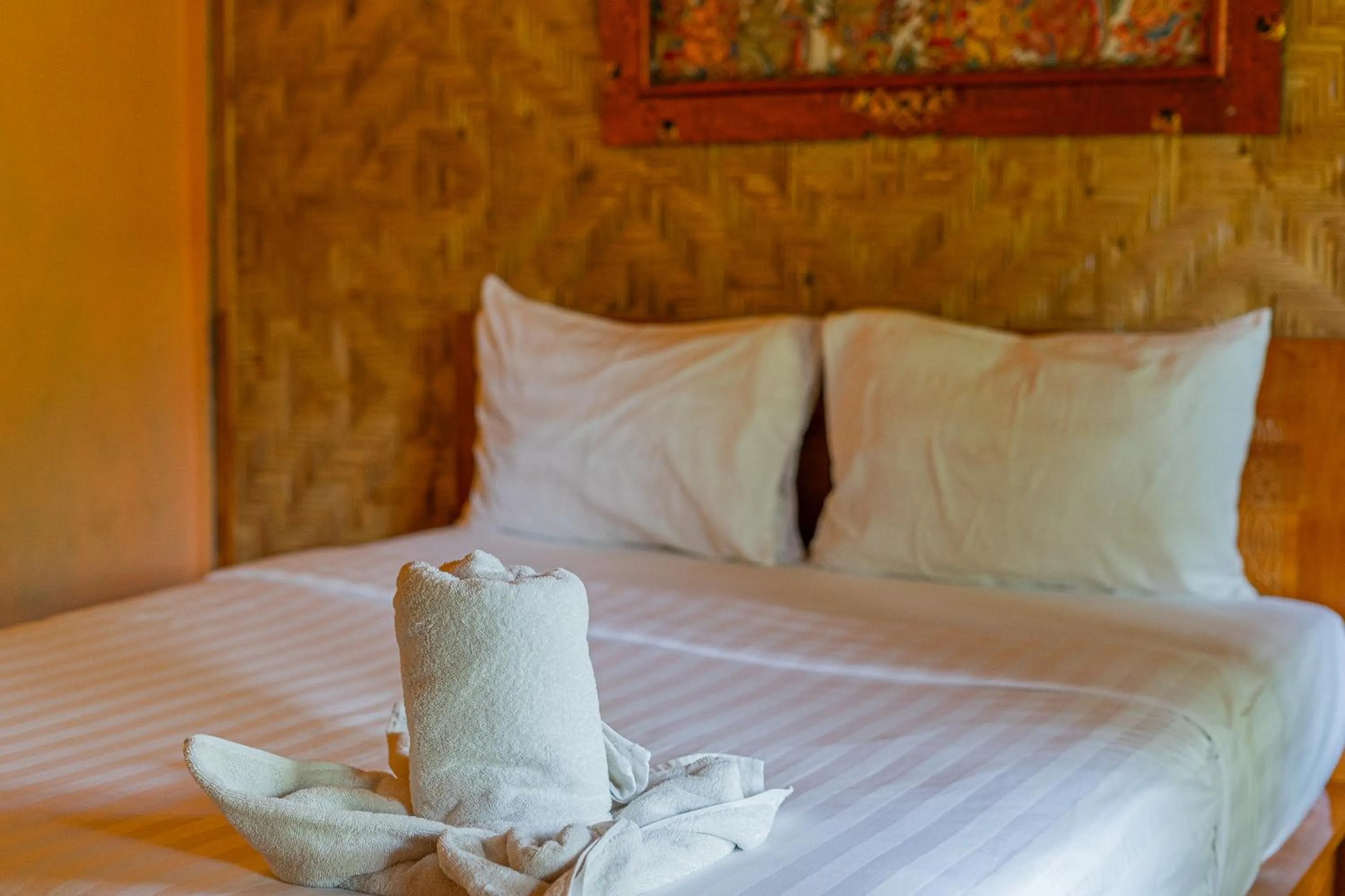 Bed in Rijet Villa Beach & Restaurant