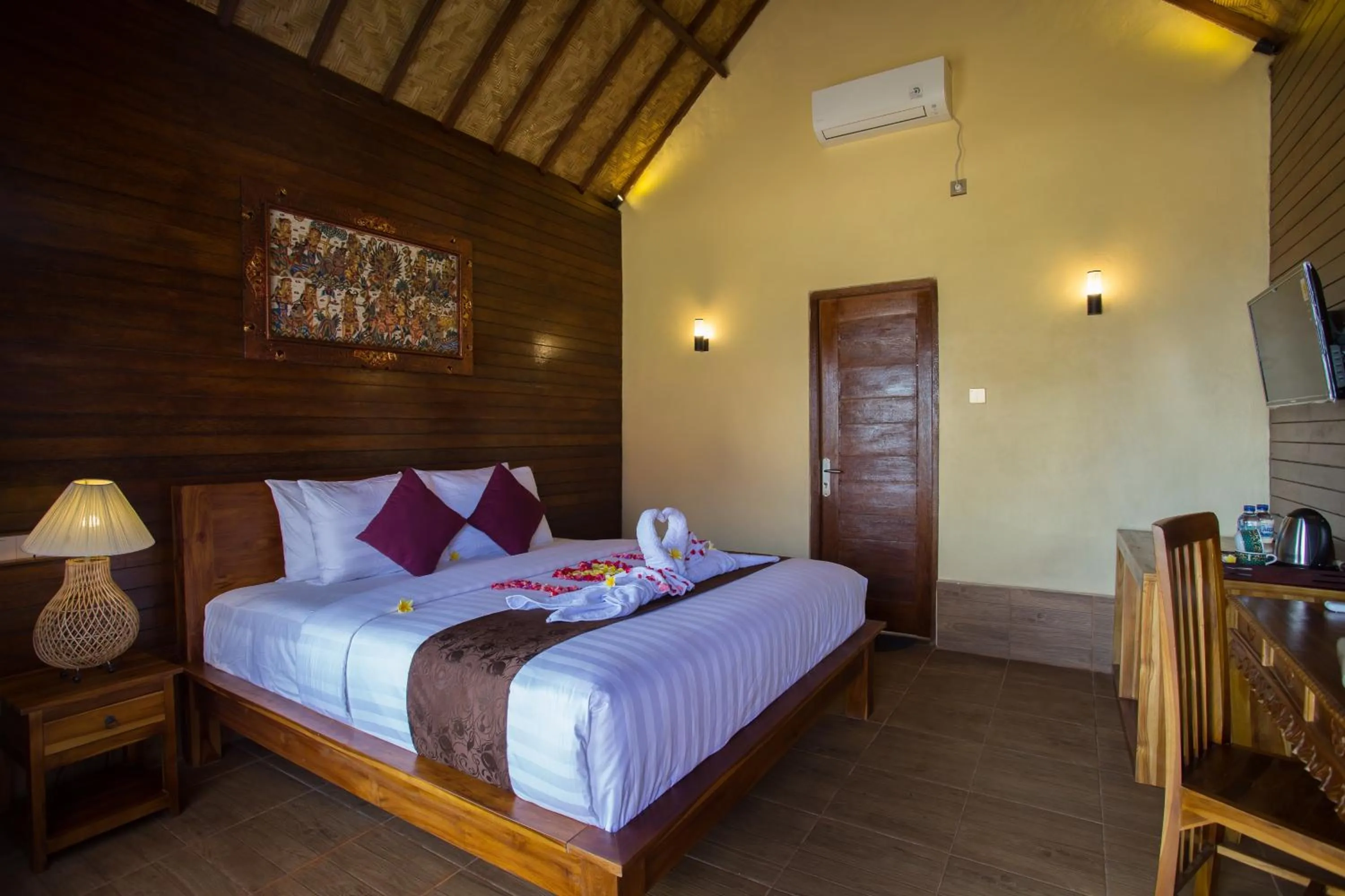Bed in Rijet Villa Beach & Restaurant