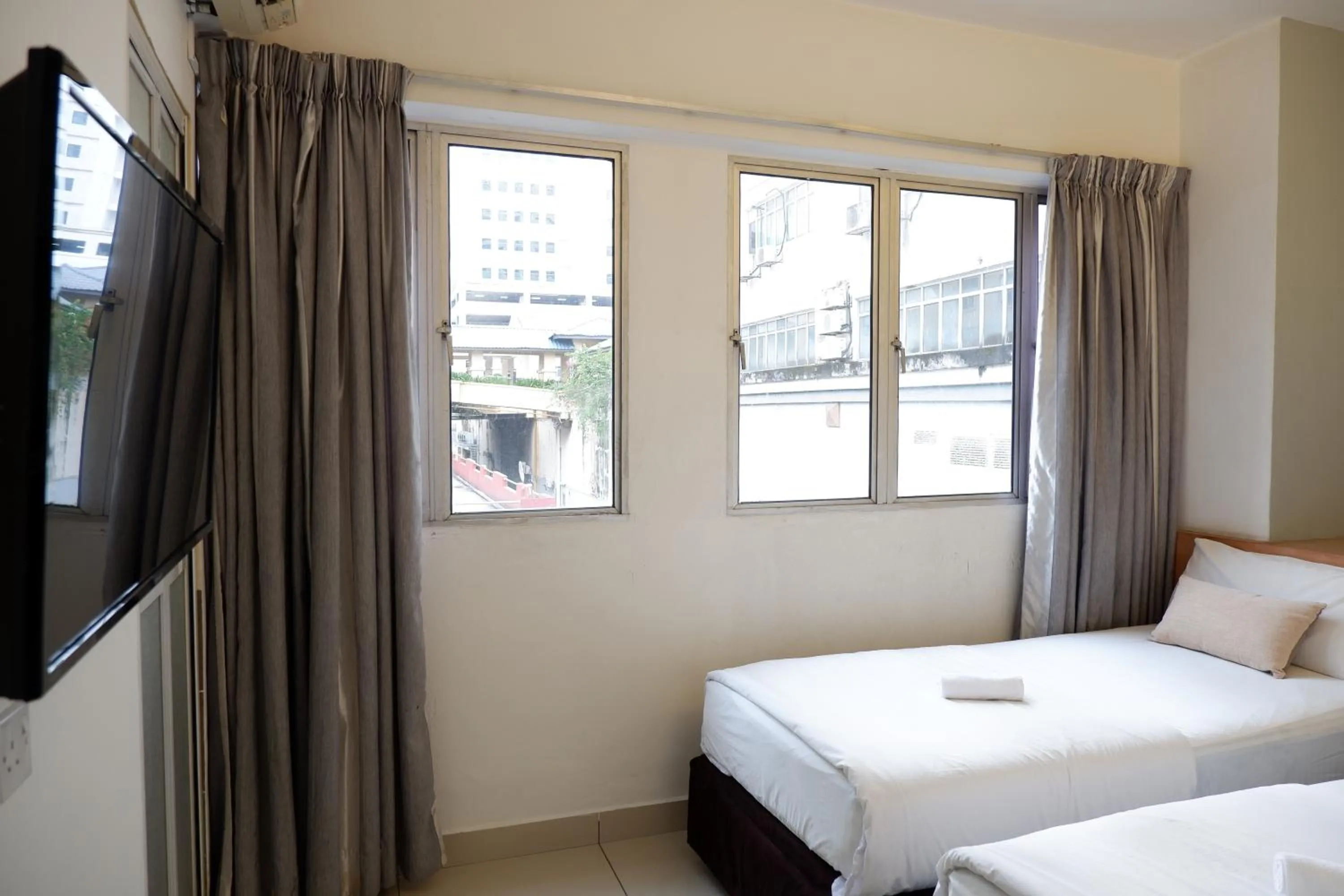 Bedroom, Bed in Indah Garden Hotel
