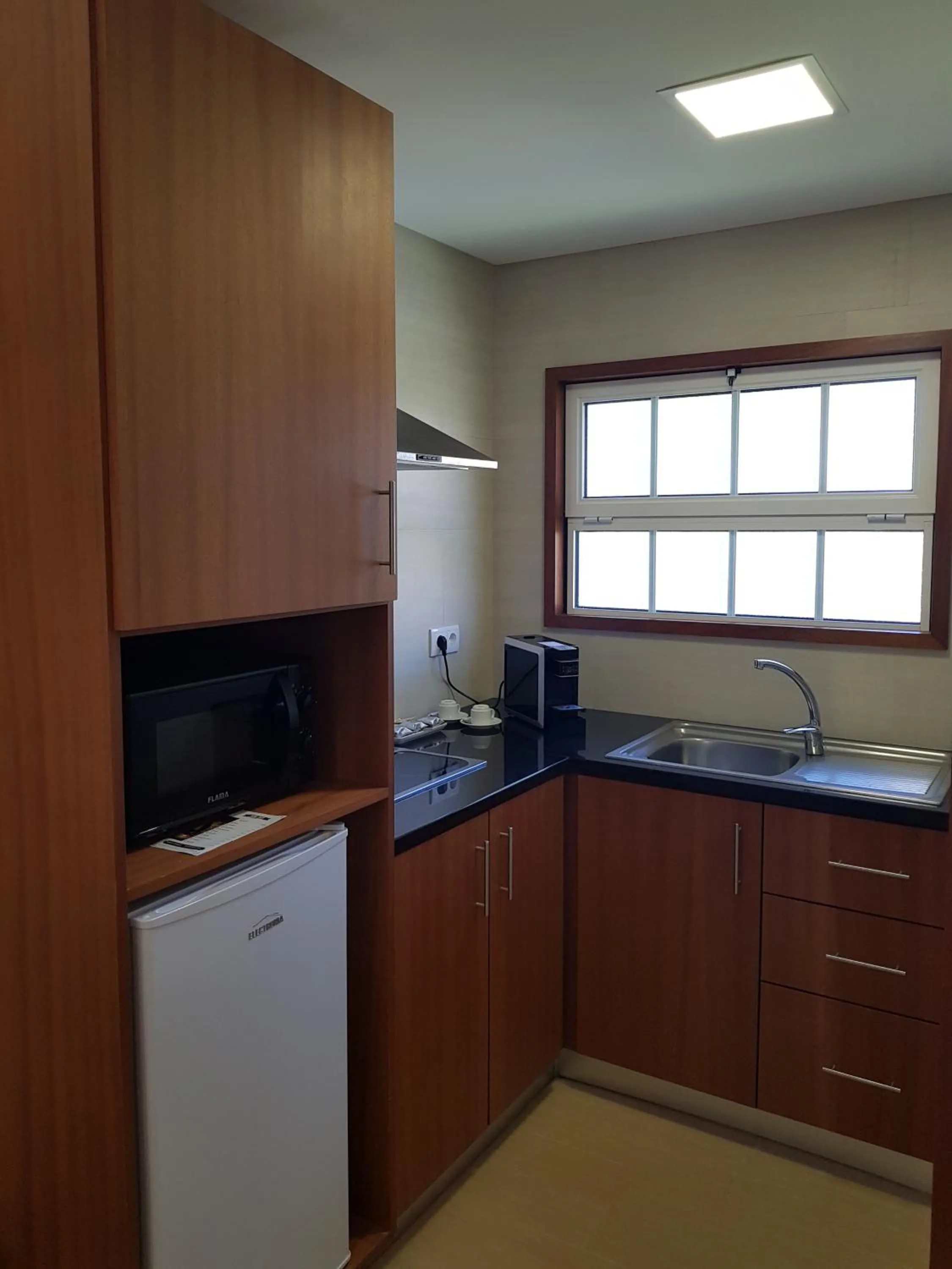 Kitchen or kitchenette in Solar Do Conde Garden Hotel