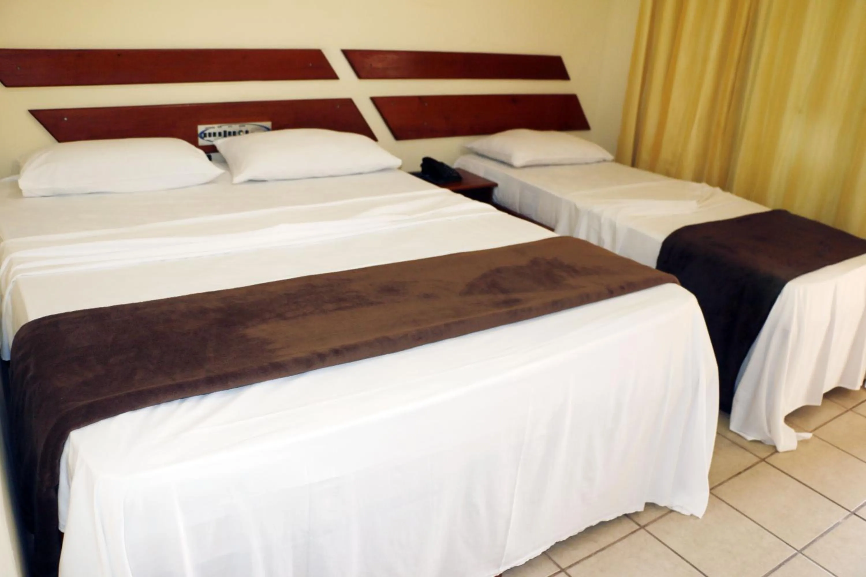 Bed in Coroa Bella Praia Hotel