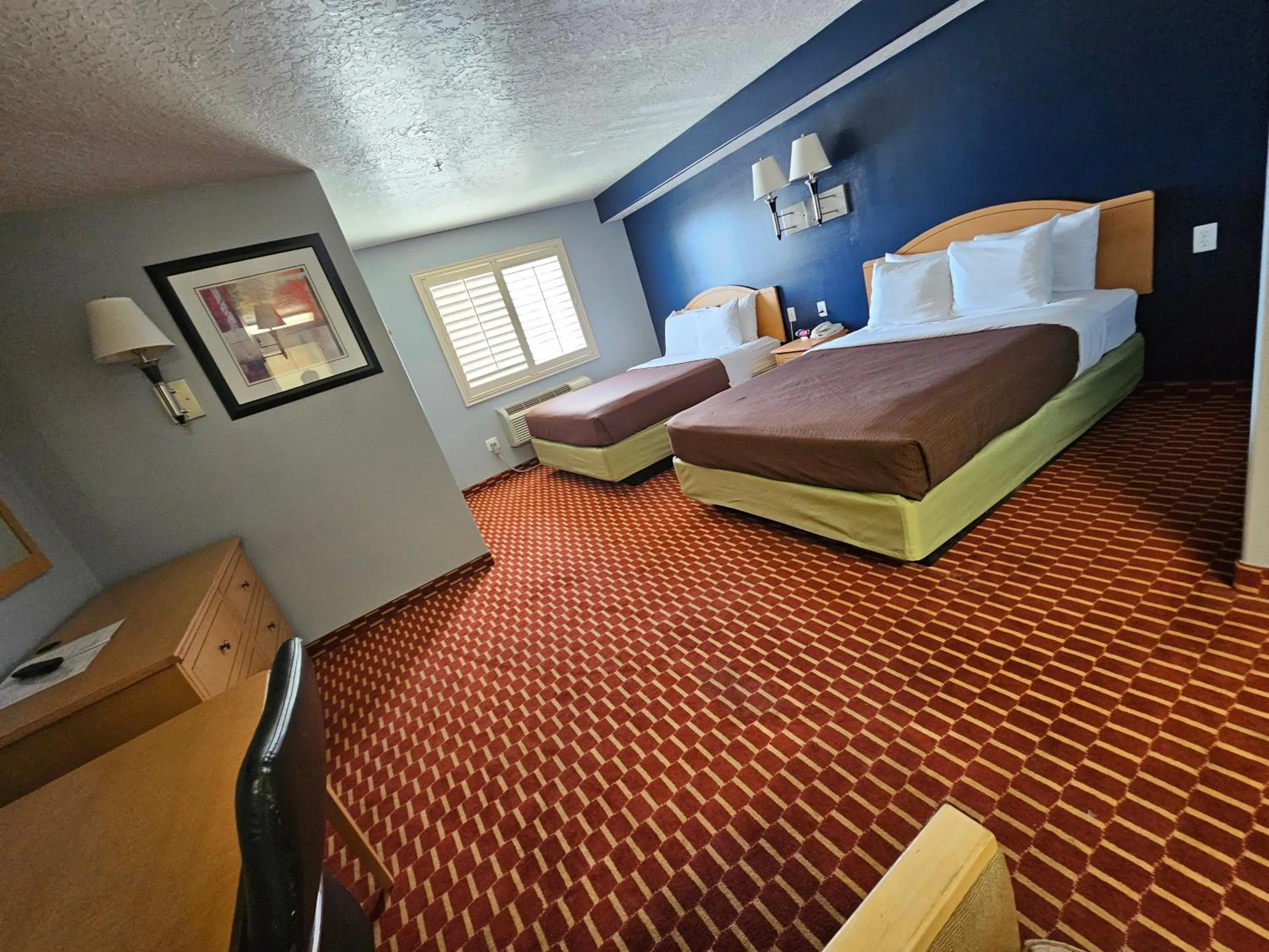 Bed in Executive Inn & Suites Extended Stay - Vernal