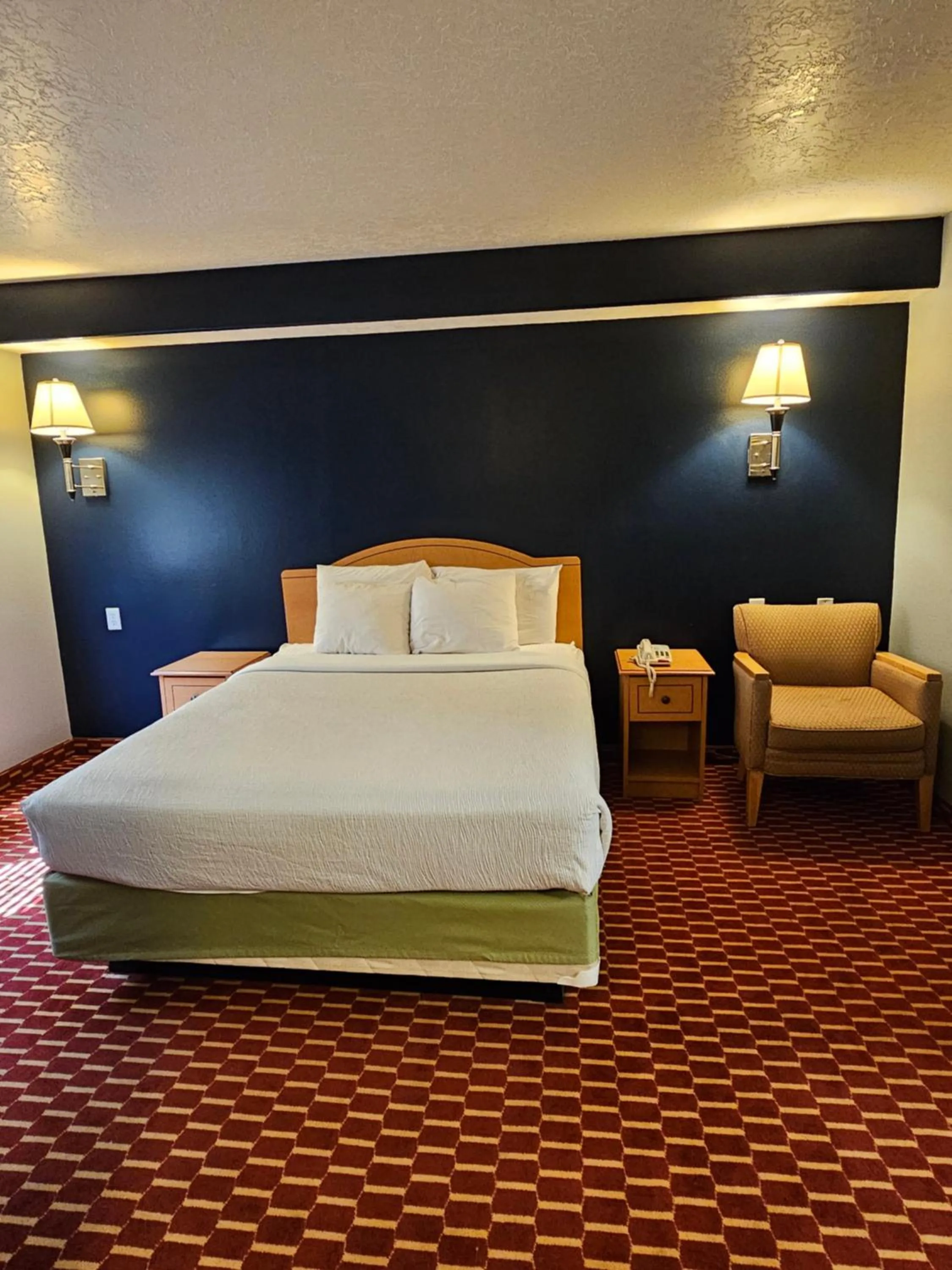 Bed in Executive Inn & Suites Extended Stay - Vernal