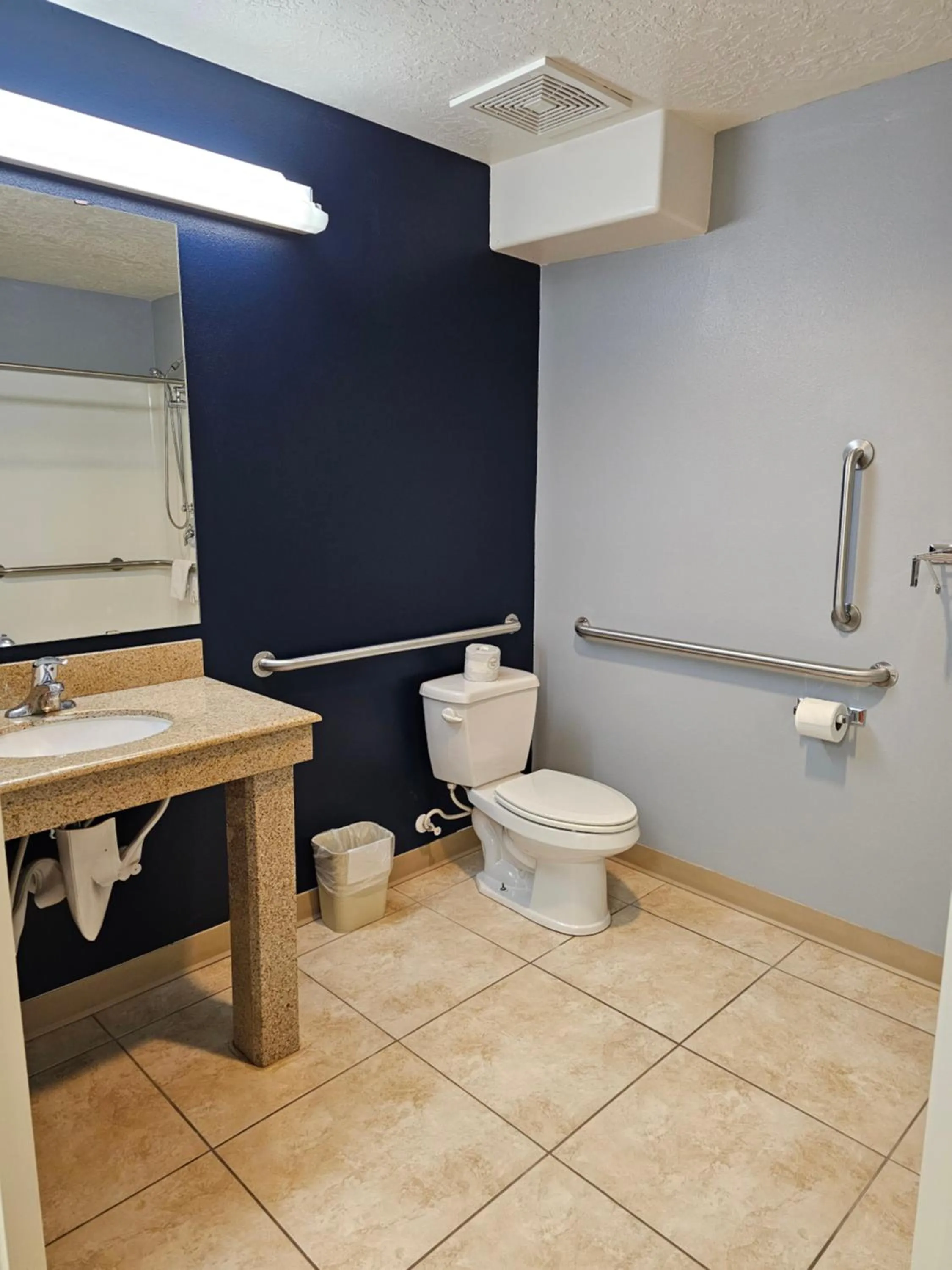 Toilet in Executive Inn & Suites Extended Stay - Vernal
