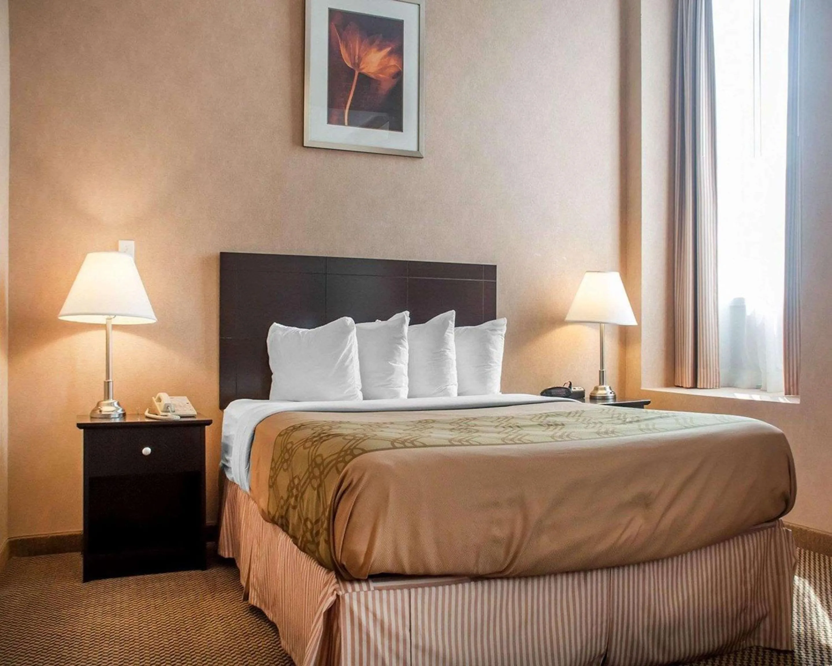 Bedroom in Woodstock Inn and Suites