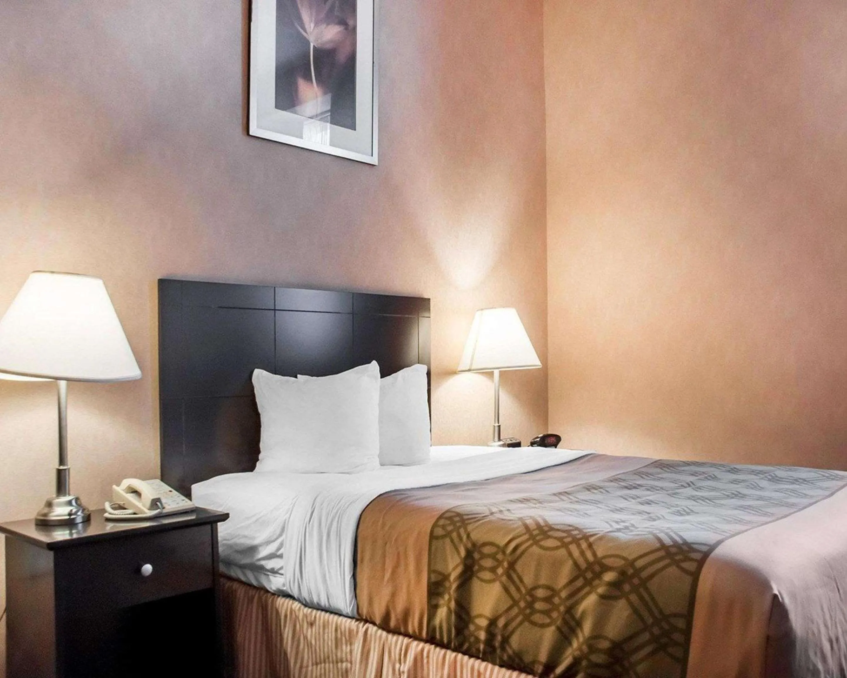 Bedroom in Woodstock Inn and Suites