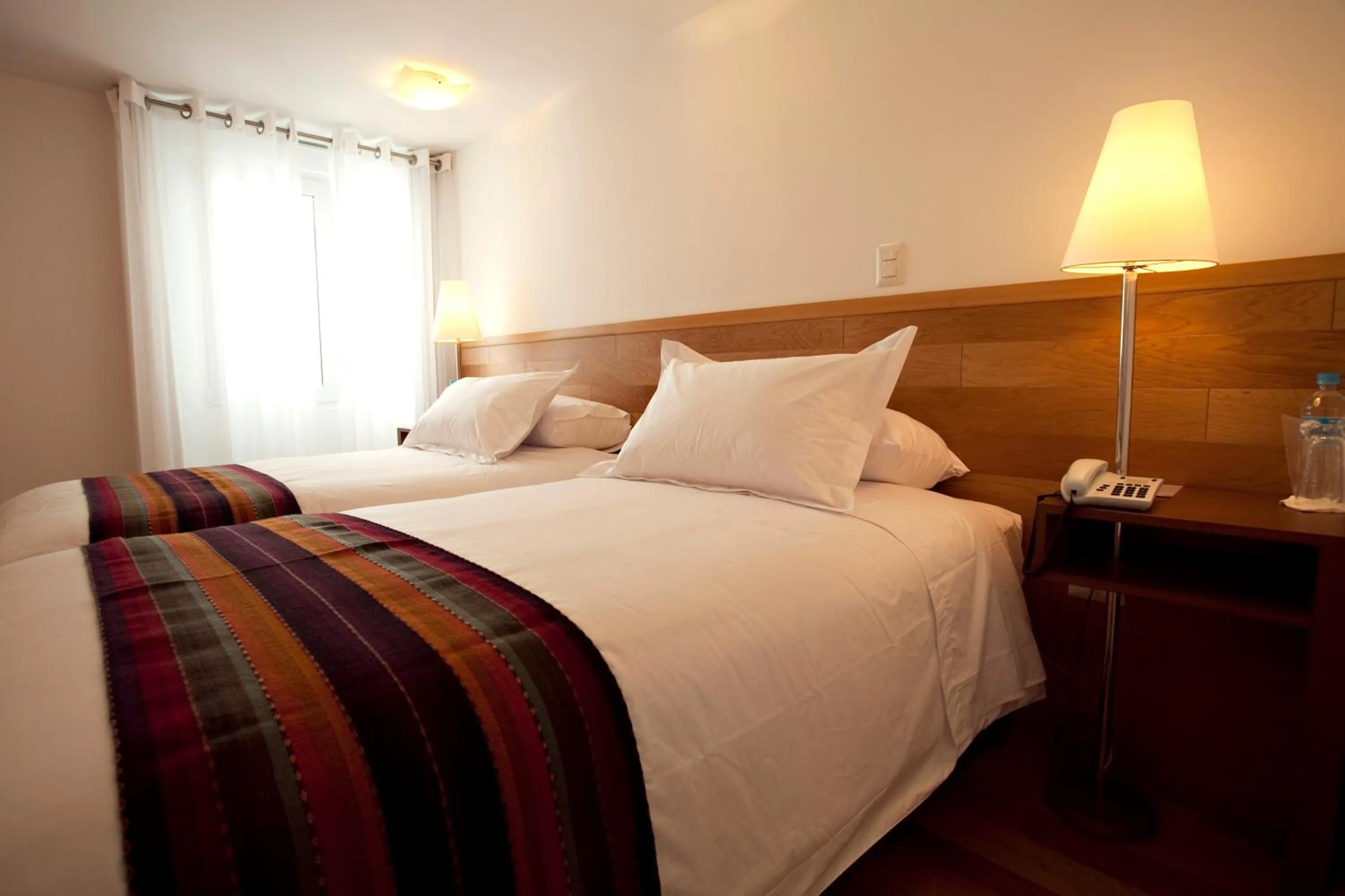 Bed in Hotel Plaza de Armas Cusco