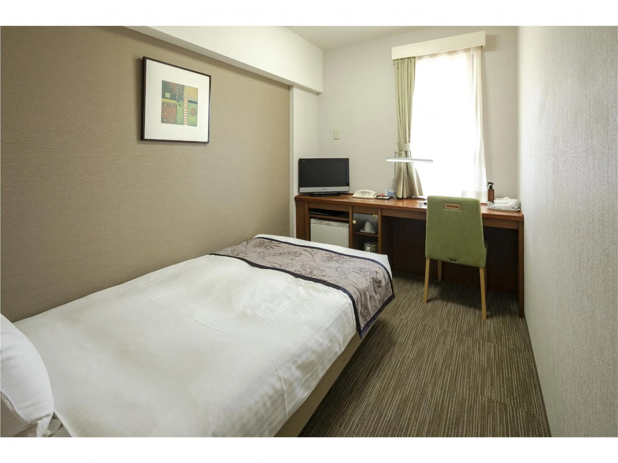Bed in Hotel Hokke Club Kumamoto