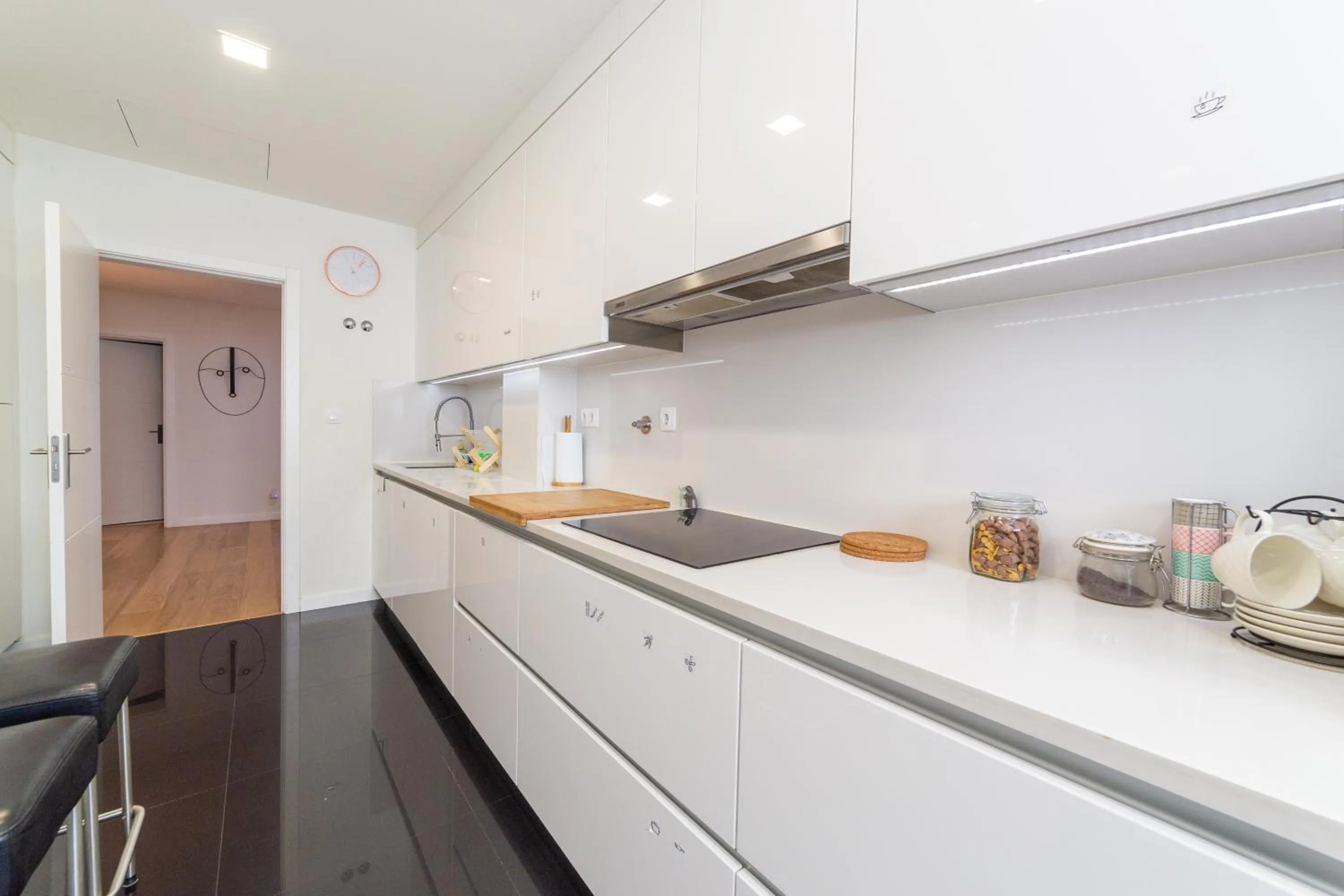 Communal kitchen in Industrial Lisbon Apartment