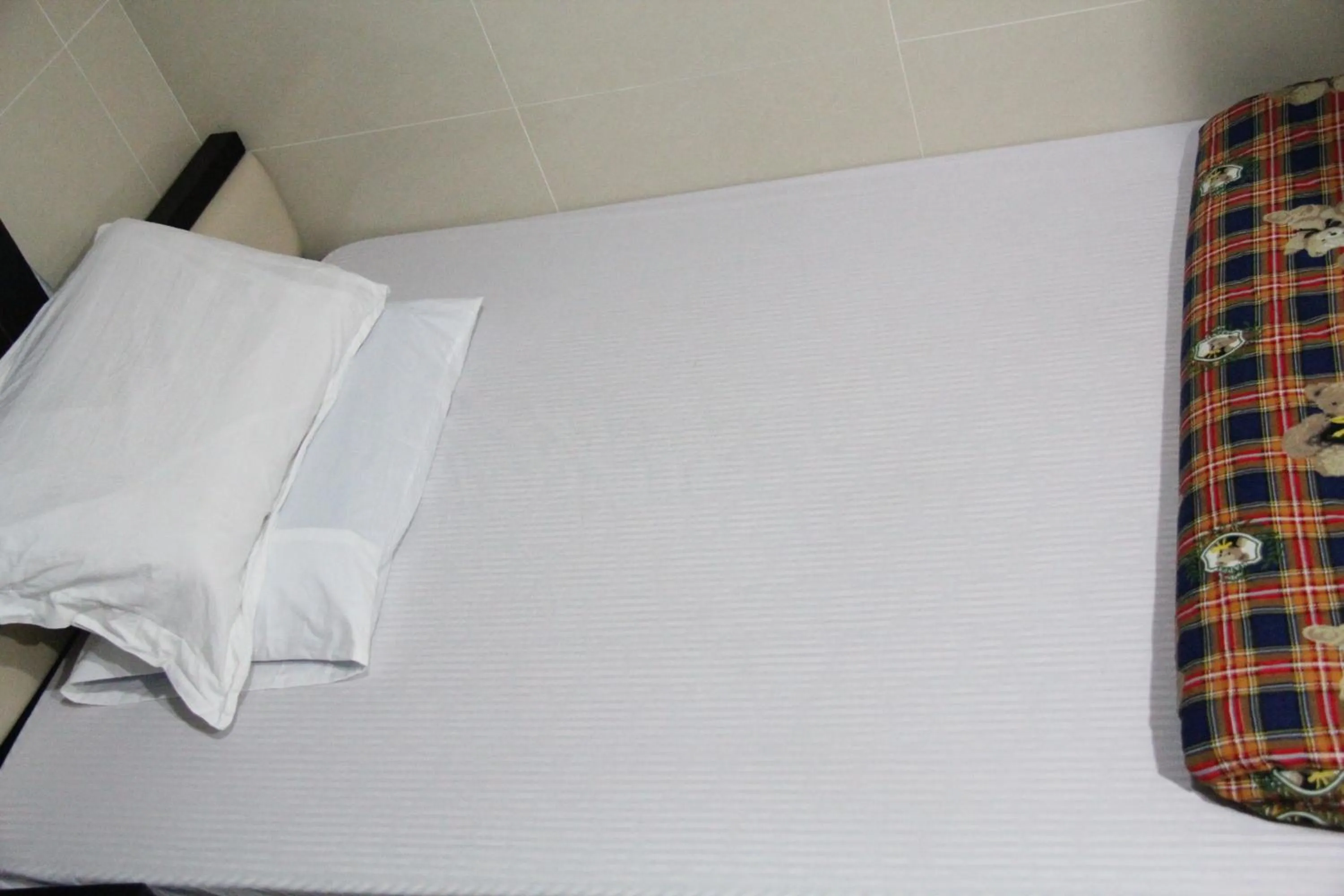 Bed in Nagaland Guesthouse