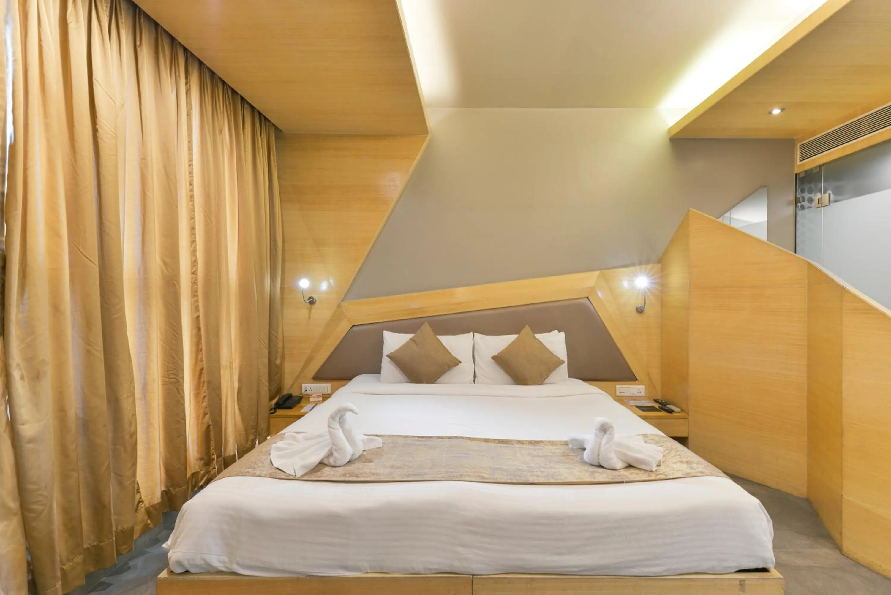 Bed in Dragonfly Hotel - The Art Hotel