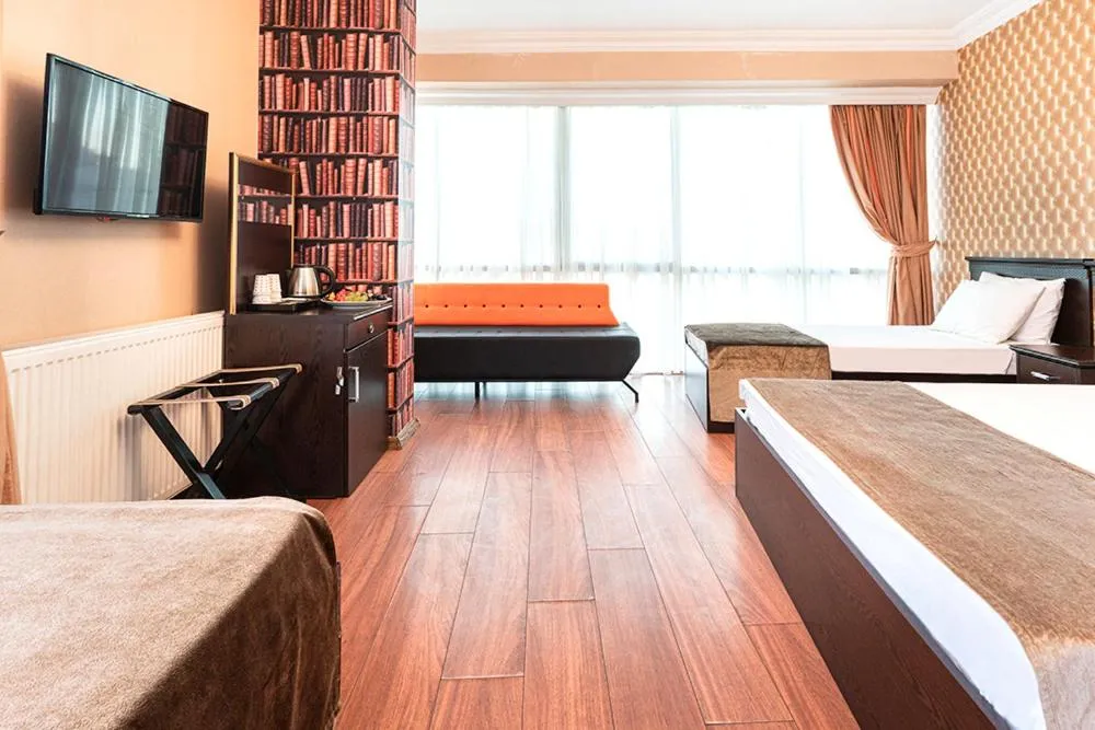 Seating area, Bed in Pamuk City Hotel