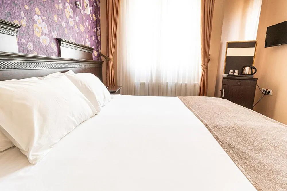 Photo of the whole room, Bed in Pamuk City Hotel