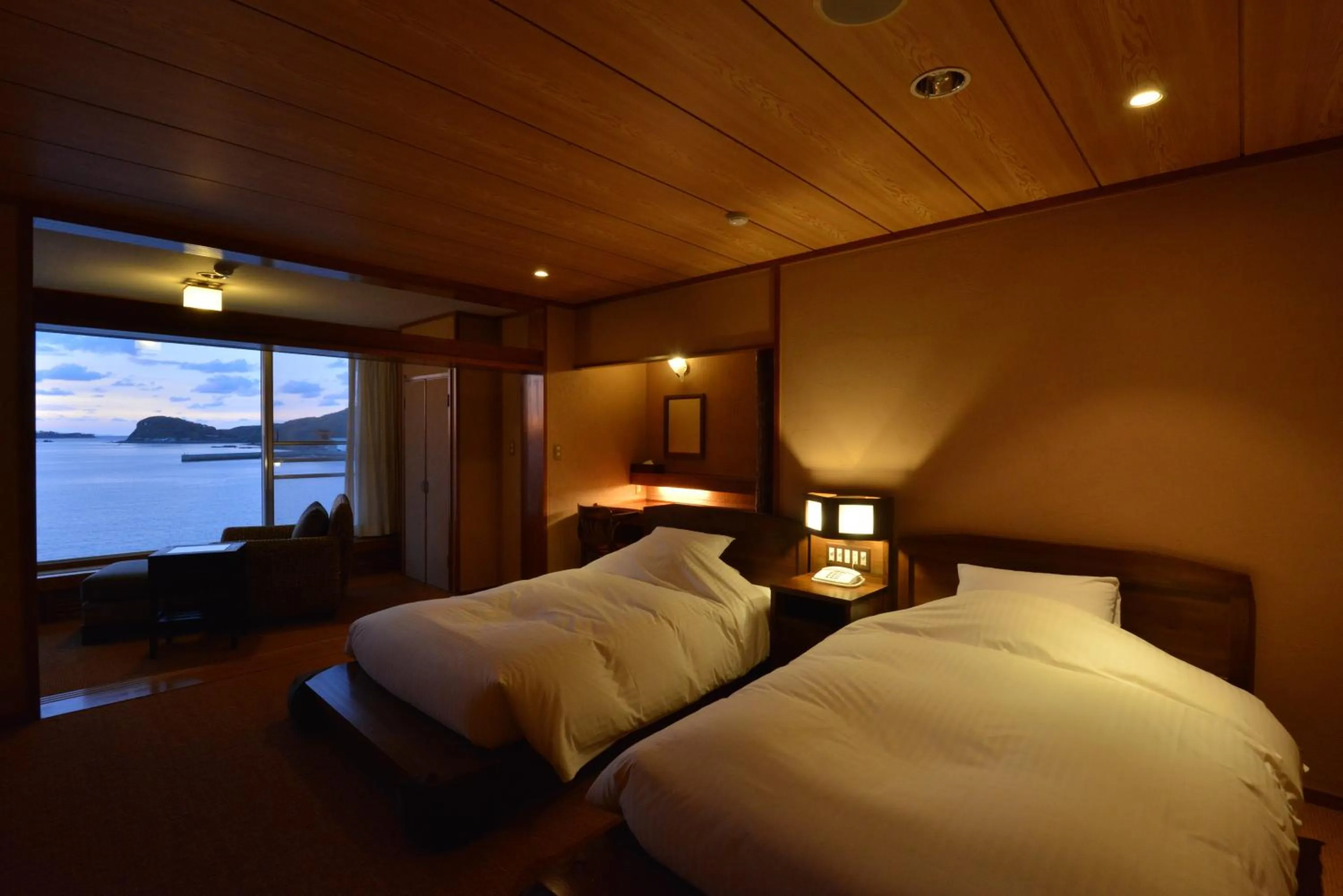 Photo of the whole room, Bed in IKI RETREAT by Onko Chishin