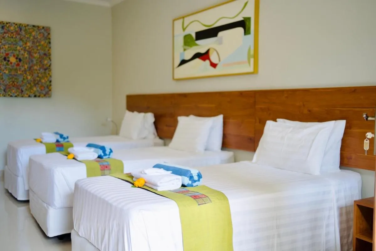 Bed in Poinciana Resort