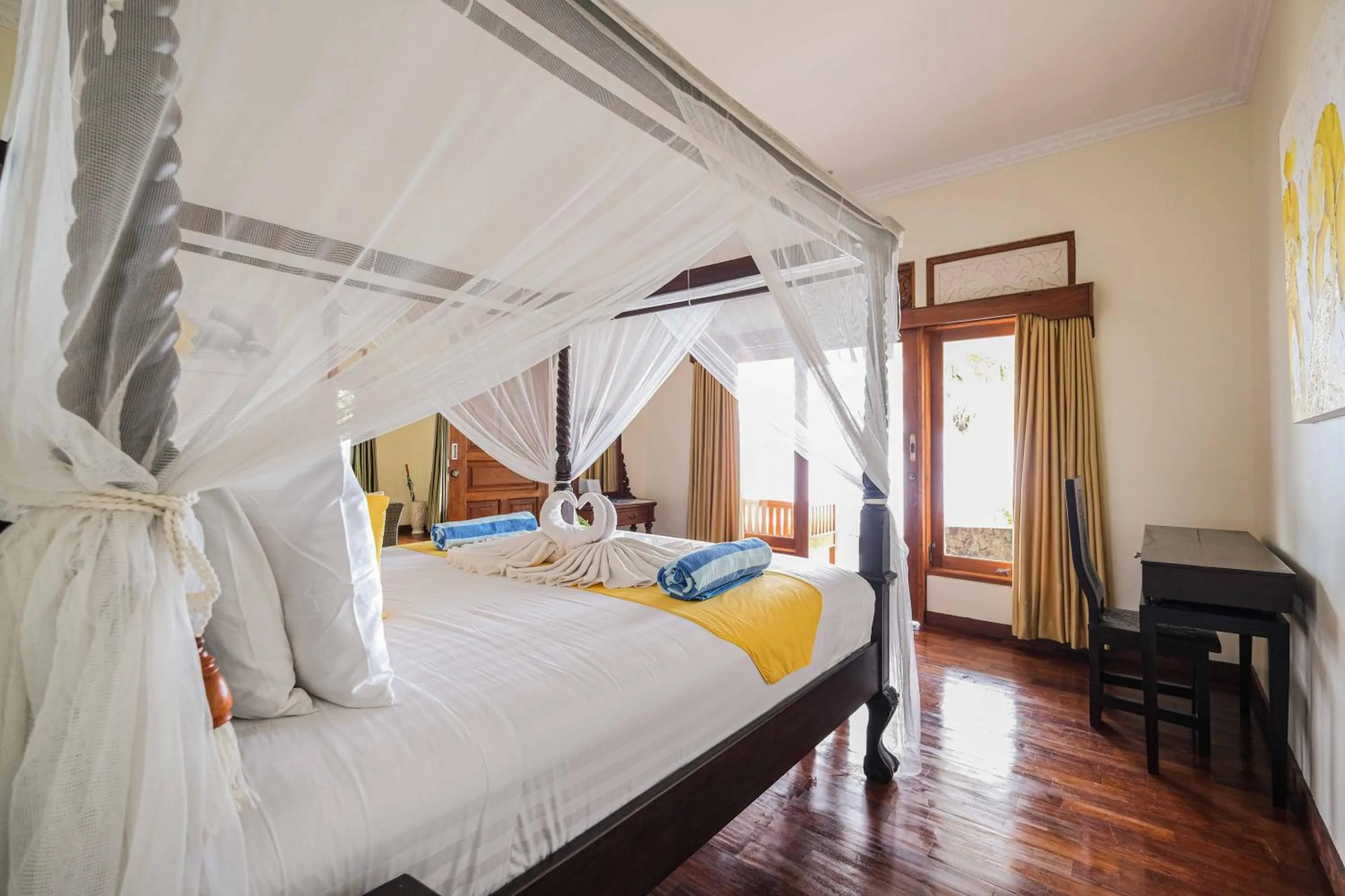 Bed in Poinciana Resort