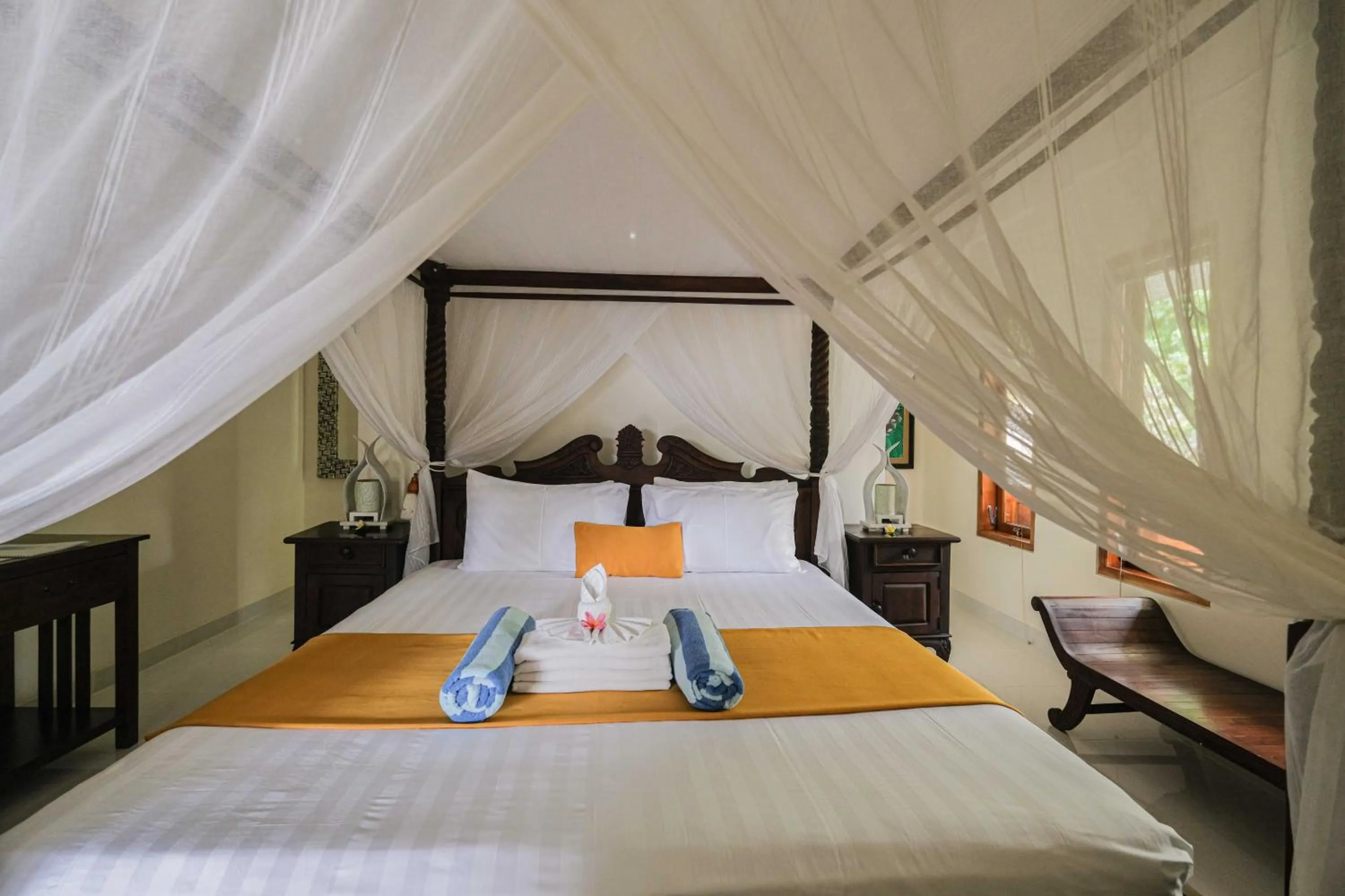 Bed in Poinciana Resort