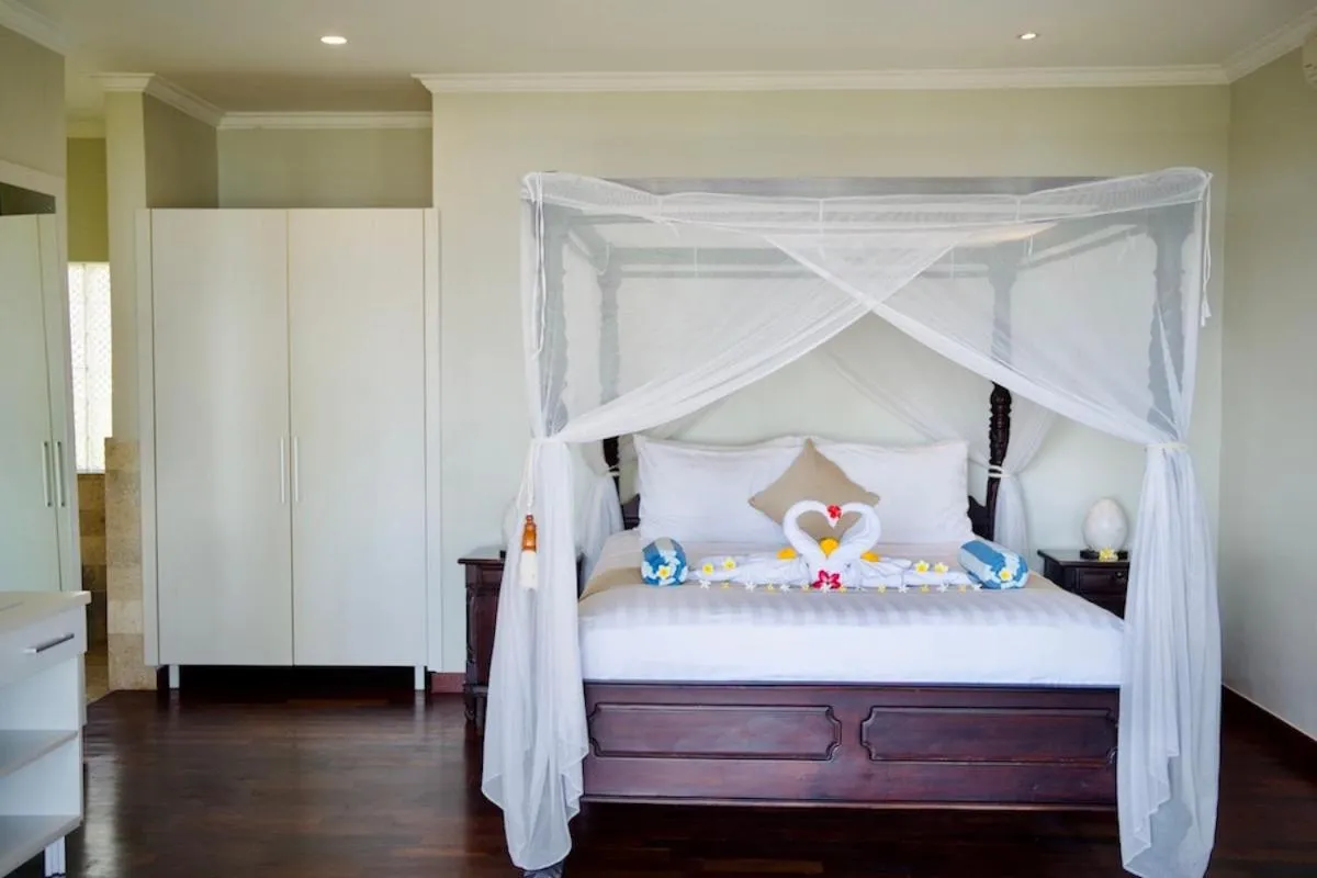 Bed in Poinciana Resort