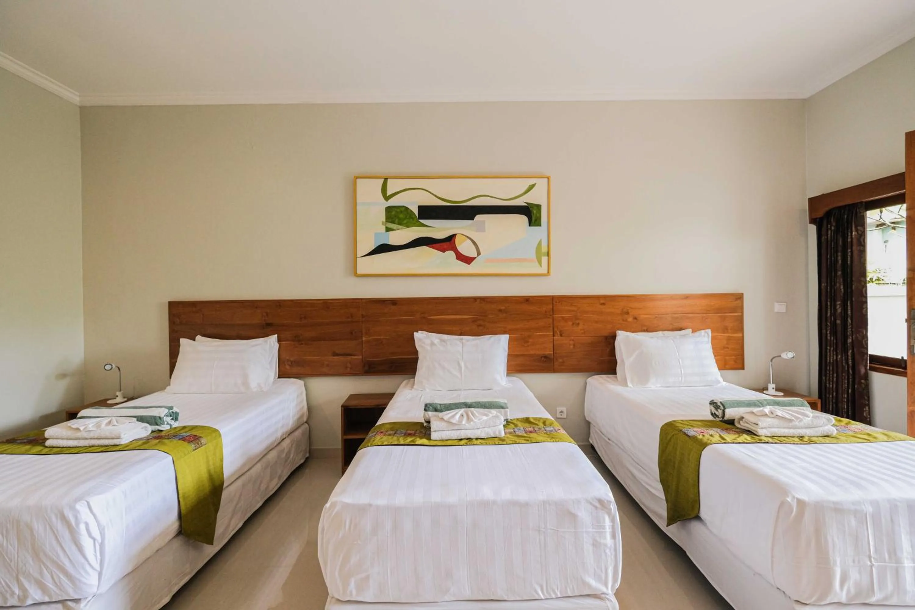 Bed in Poinciana Resort