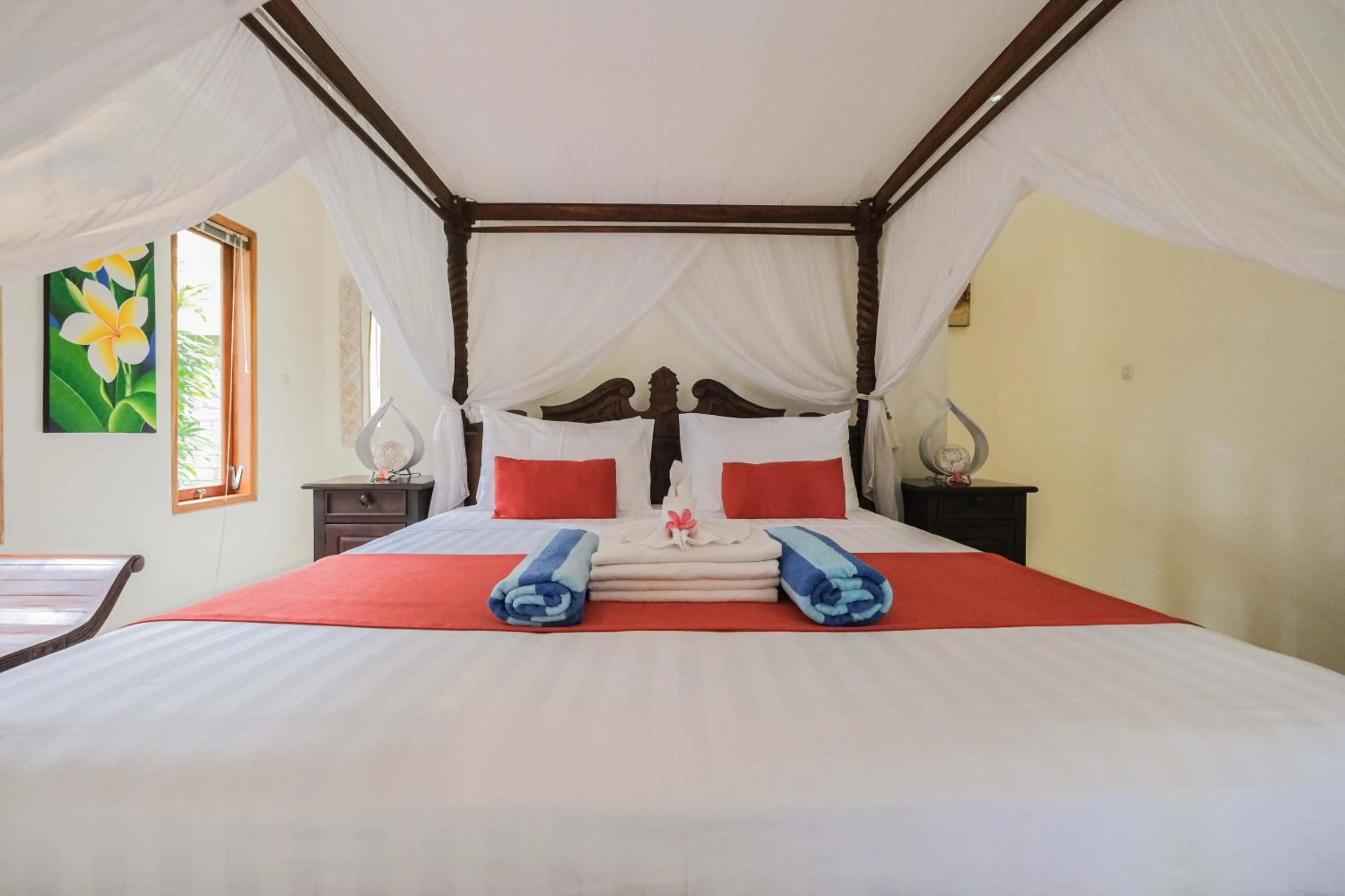 Bed in Poinciana Resort