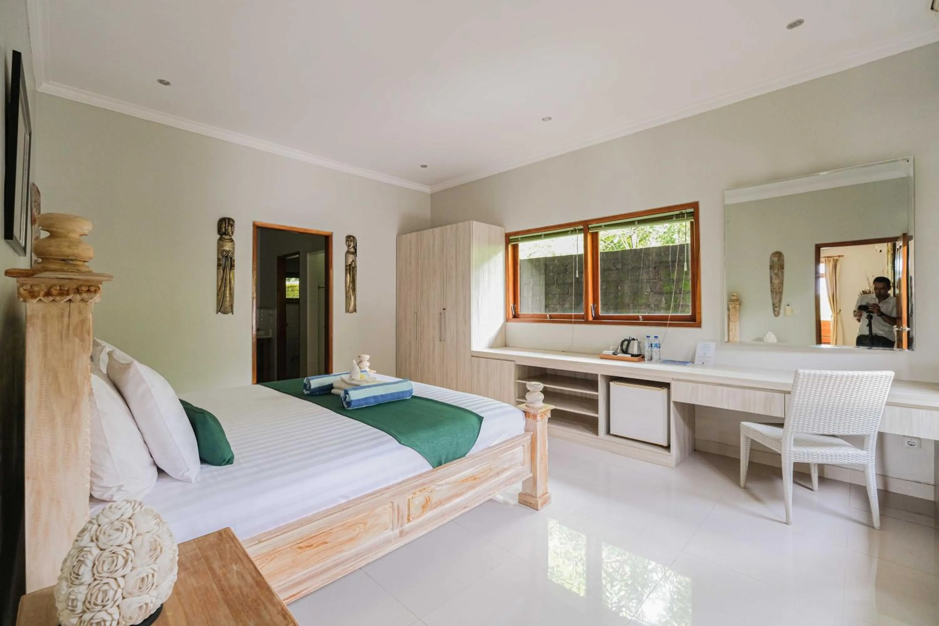 Bed in Poinciana Resort