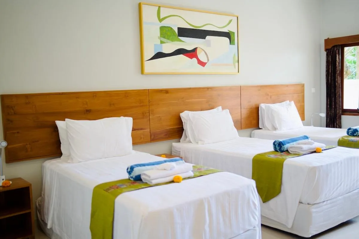 Bed in Poinciana Resort