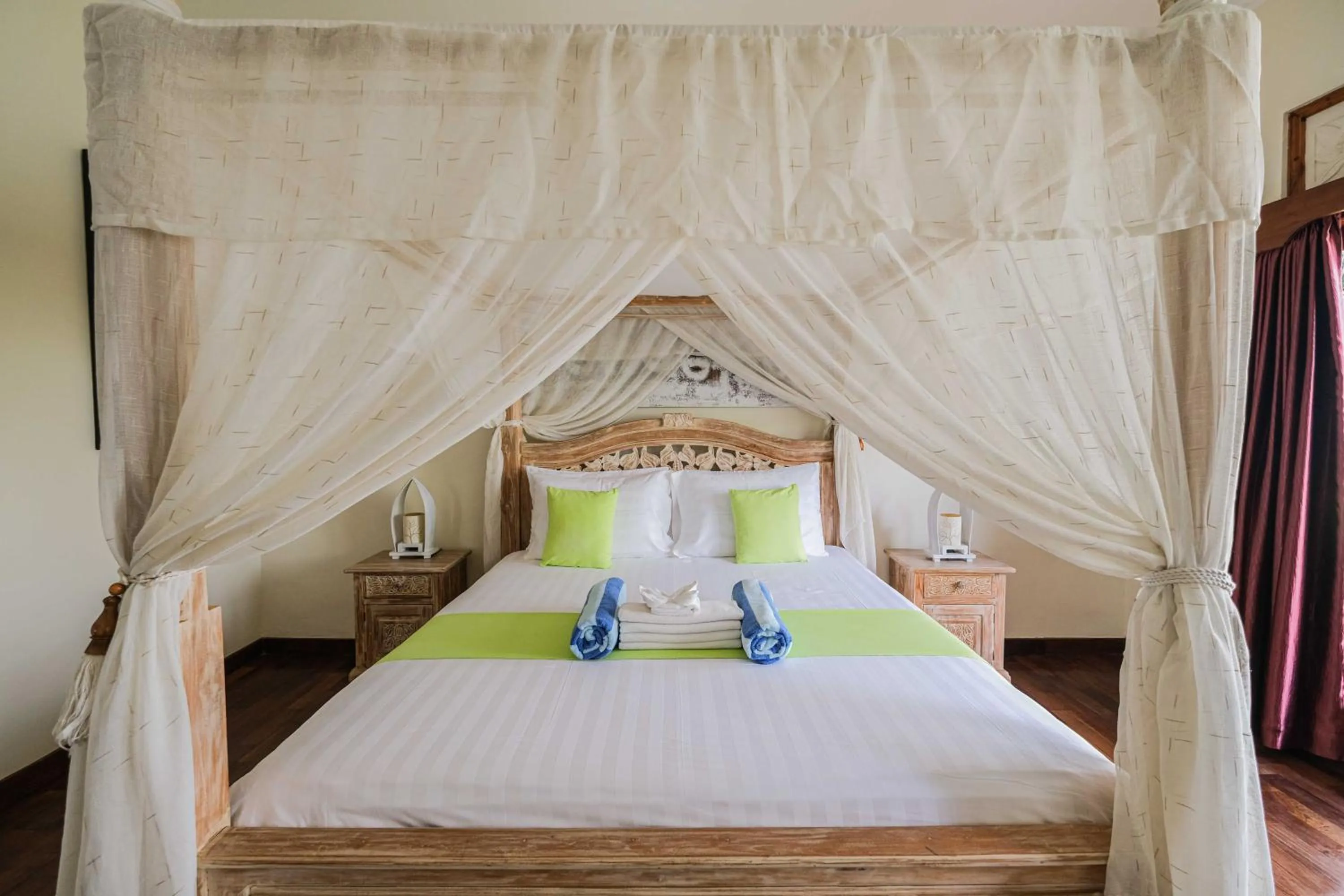 Bed in Poinciana Resort