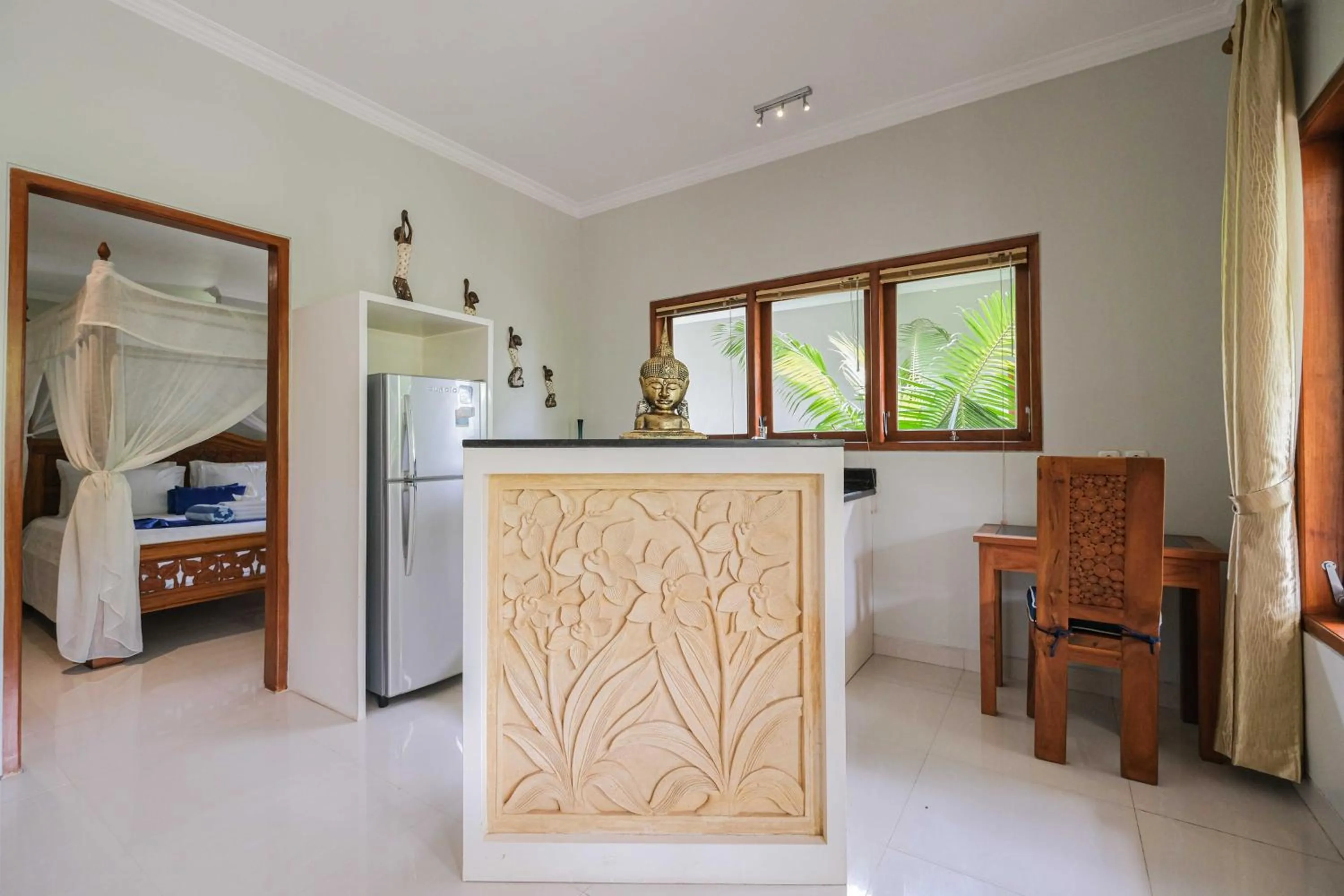 Kitchen or kitchenette, Bed in Poinciana Resort