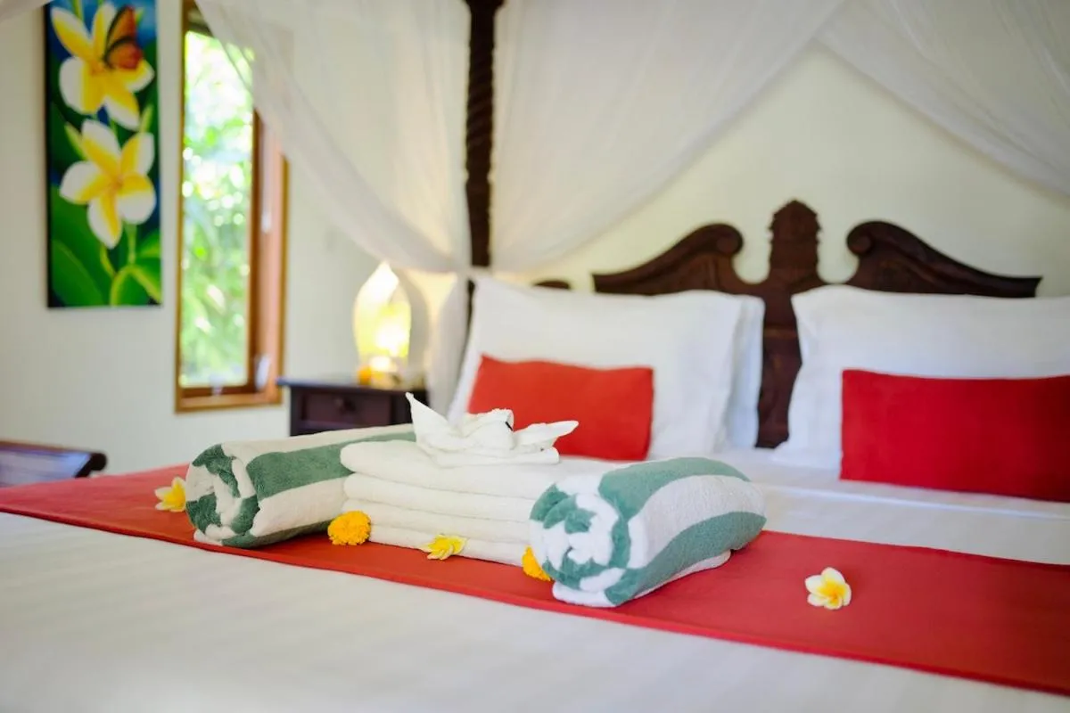 Bed in Poinciana Resort