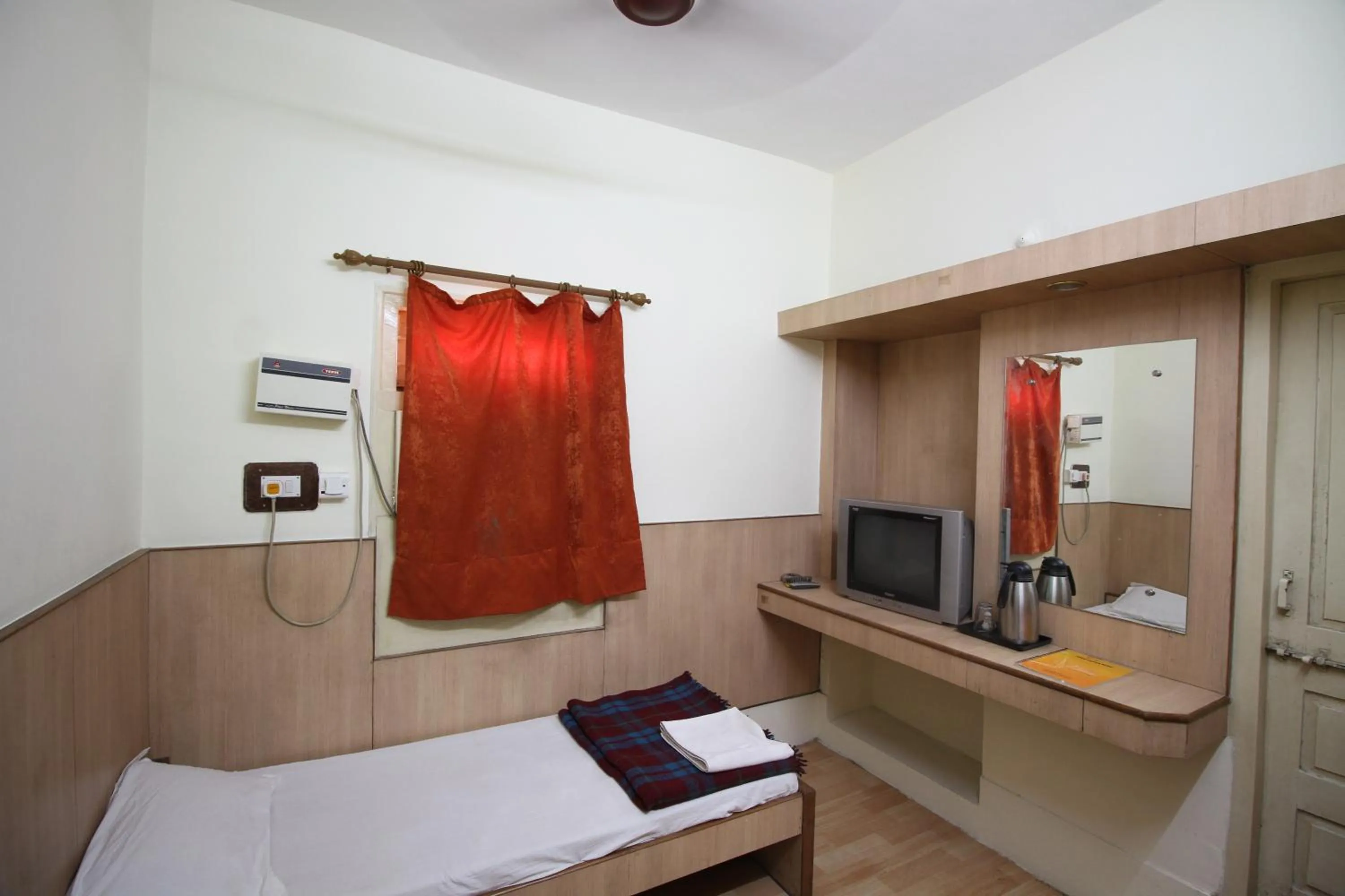 TV and multimedia, Bed in Hotel Meera