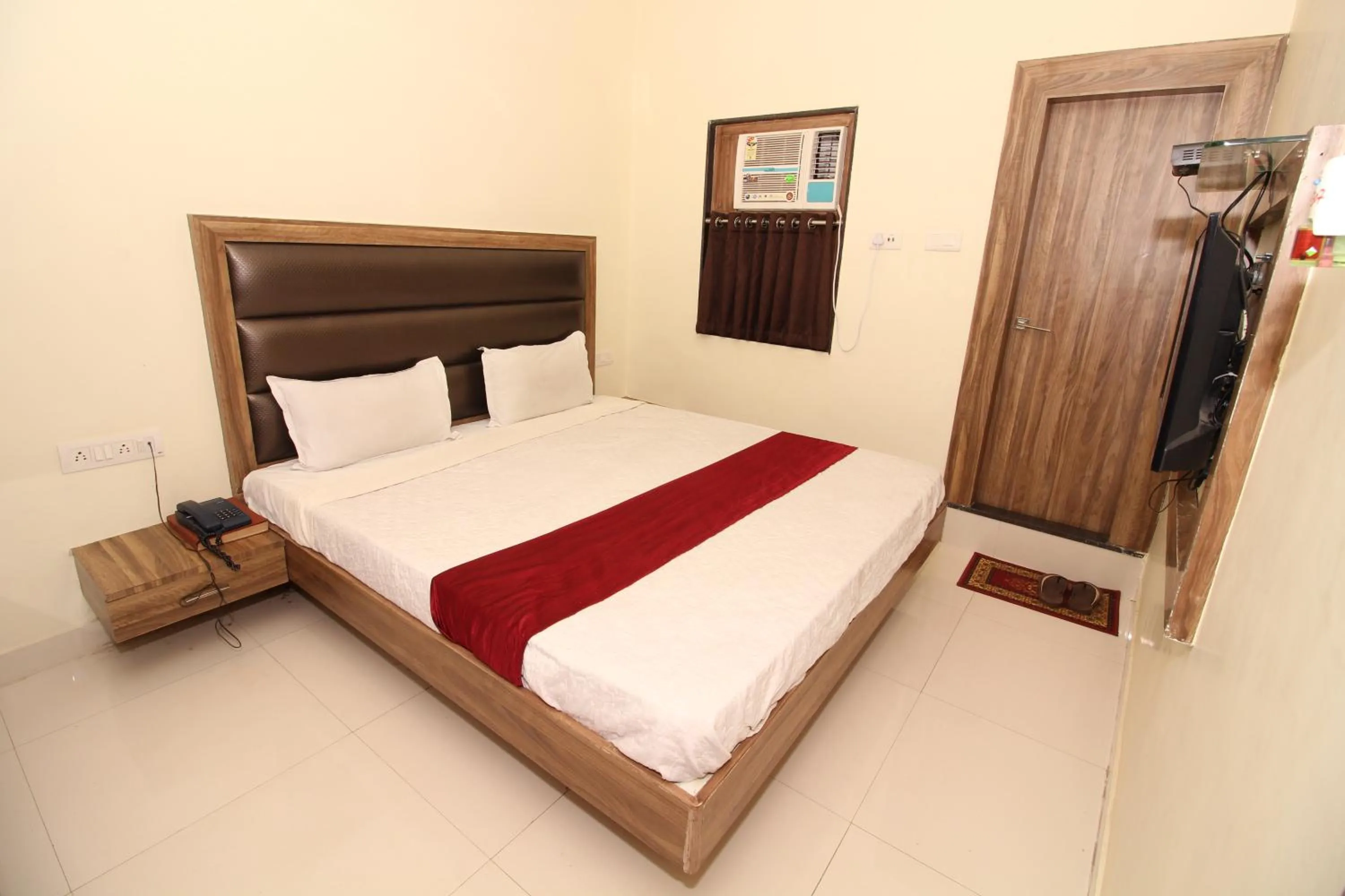 Photo of the whole room, Bed in Hotel Meera