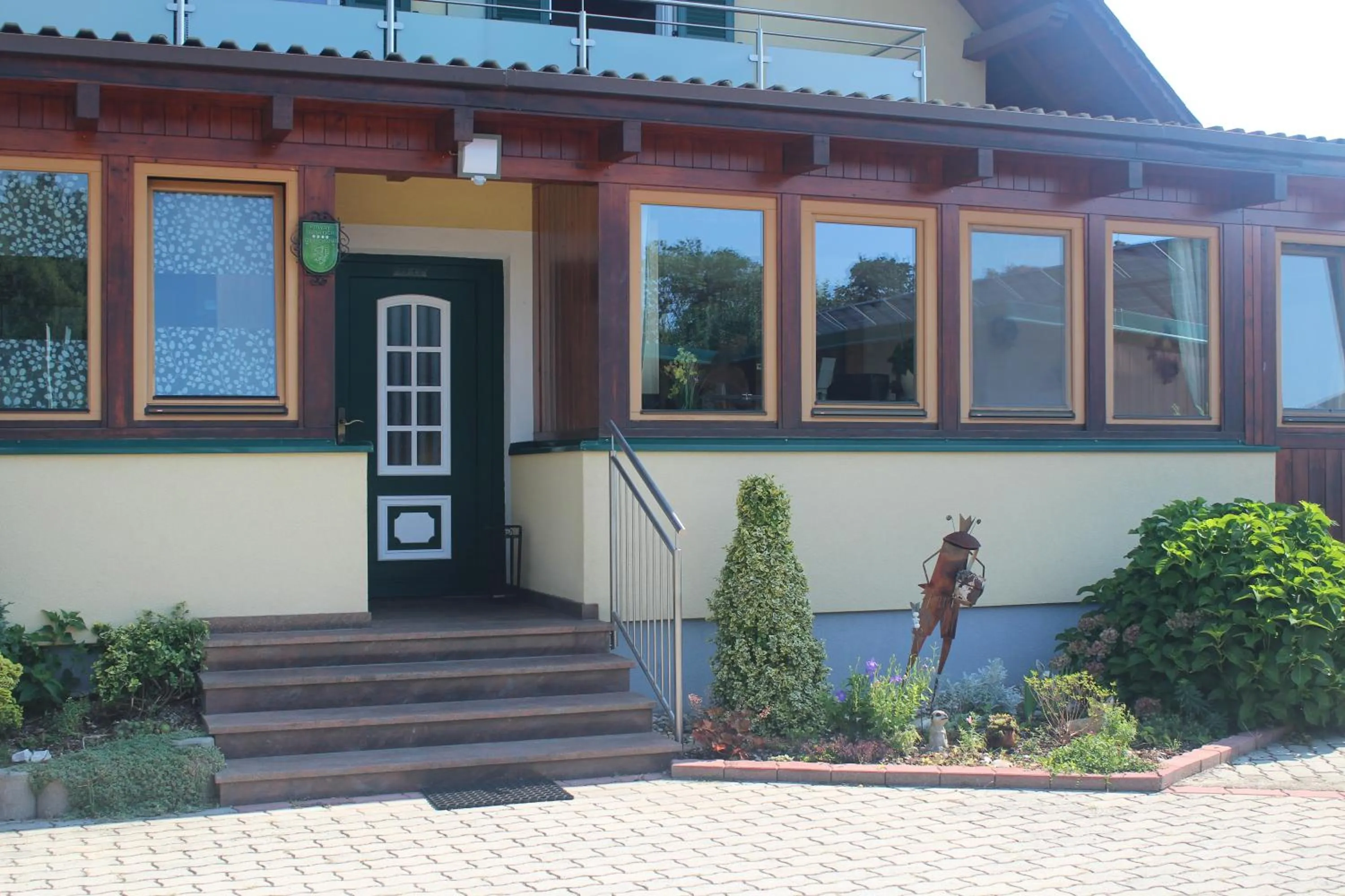 Facade/entrance in Gästehaus Christa ****
