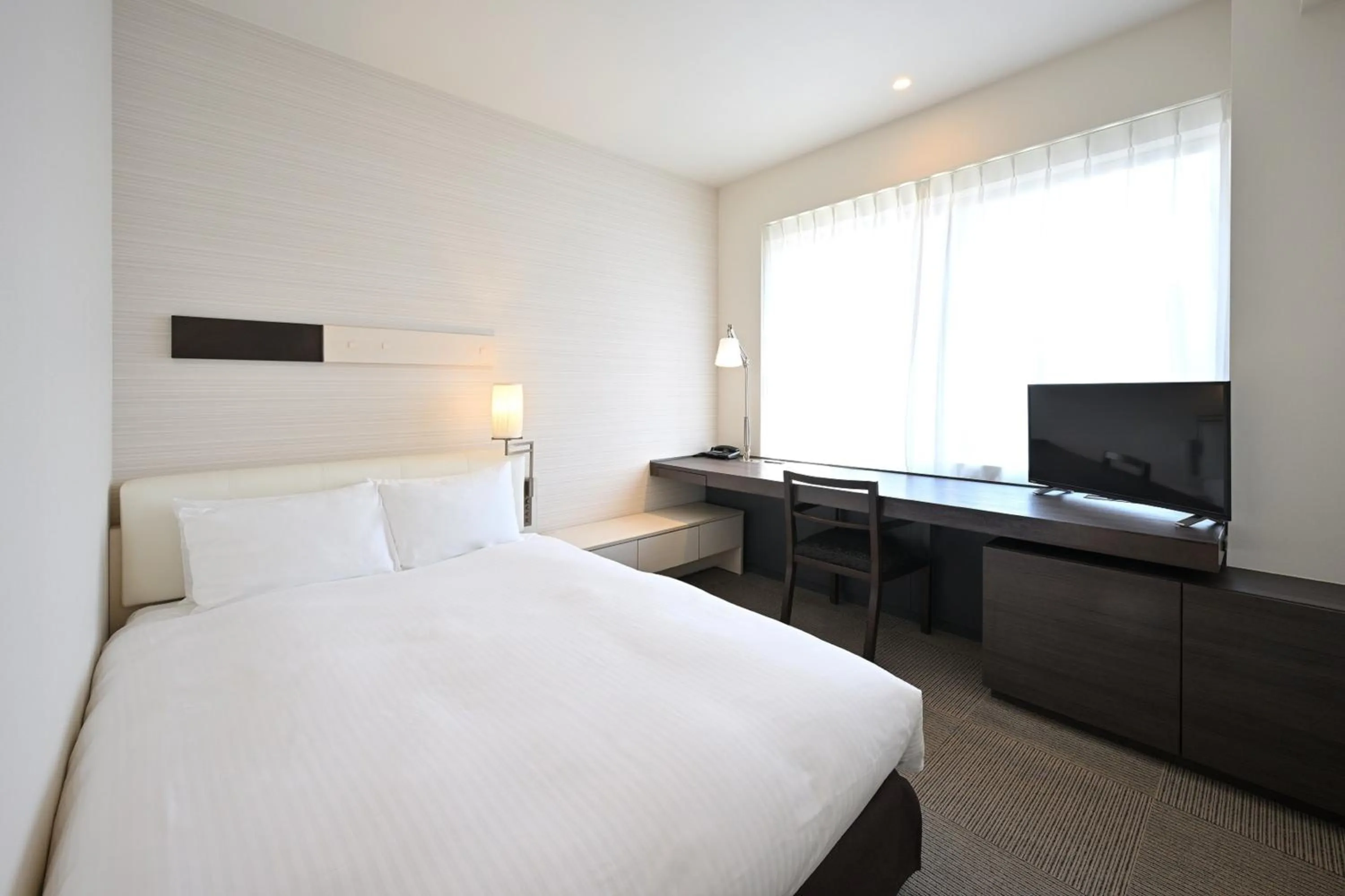 Photo of the whole room, Bed in Hotel Keihan Tokyo Yotsuya
