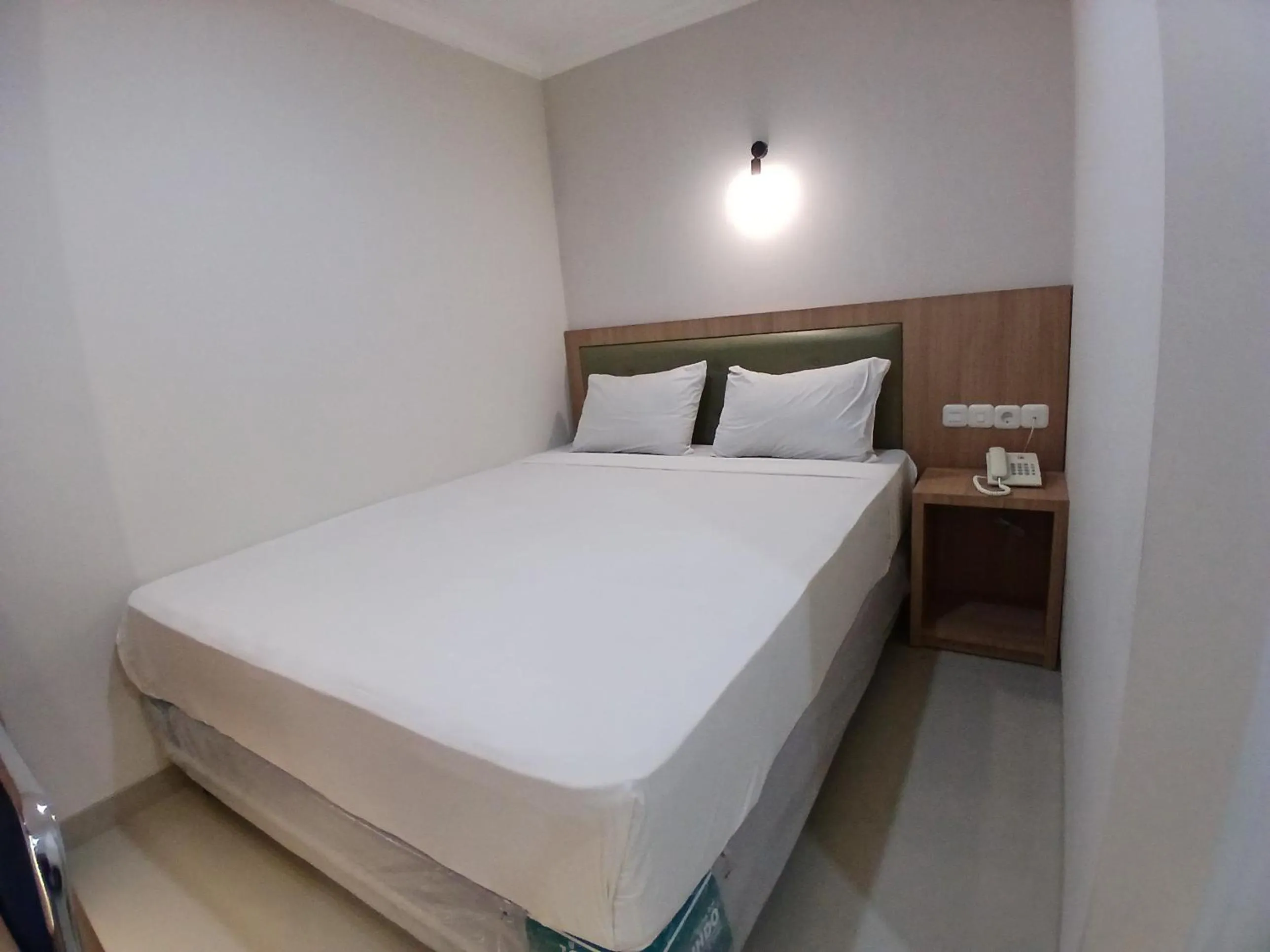 Bed in Ethan Hotel Kelapa Gading
