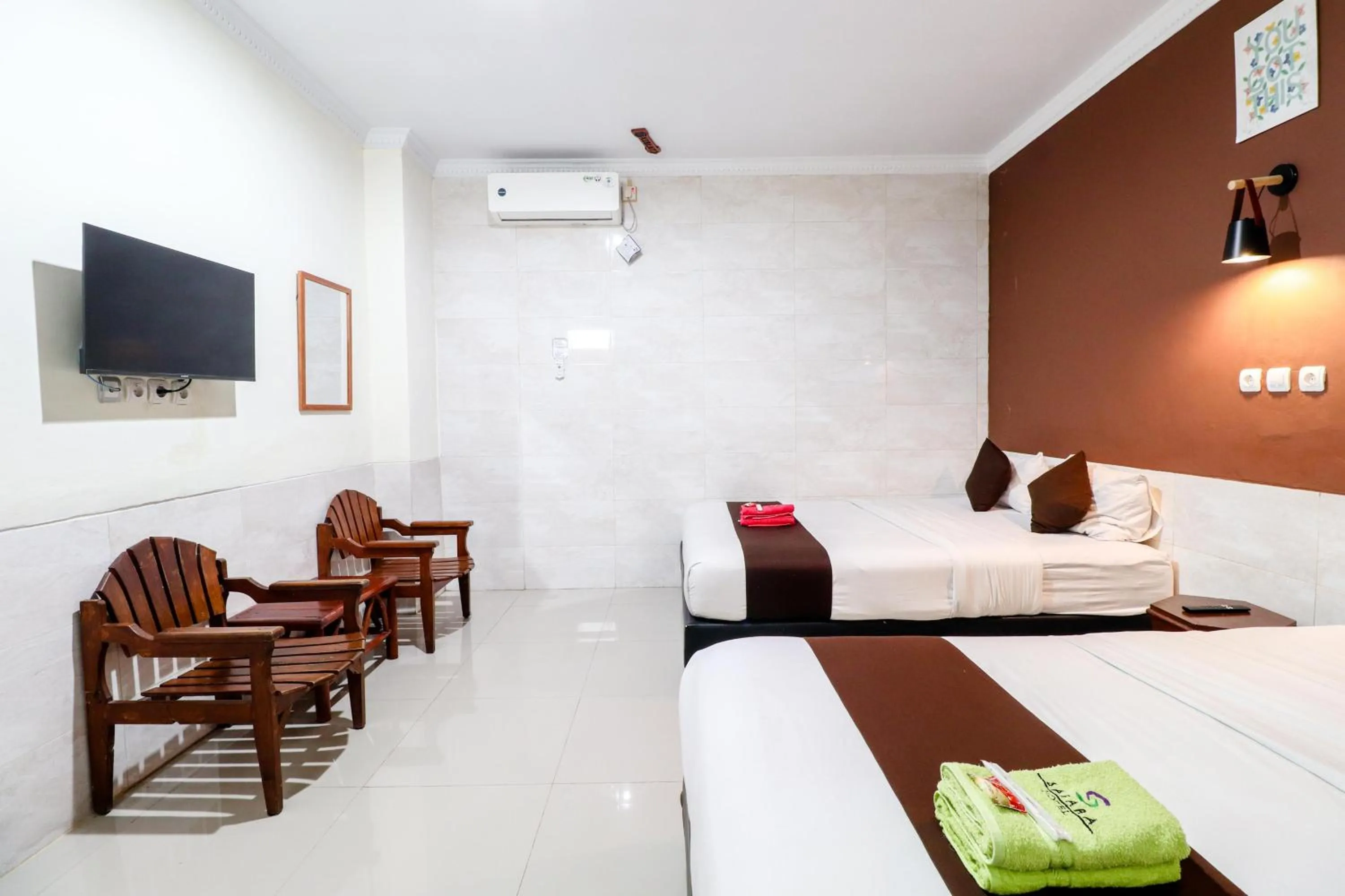 Bed in Hotel Safara Yogyakarta