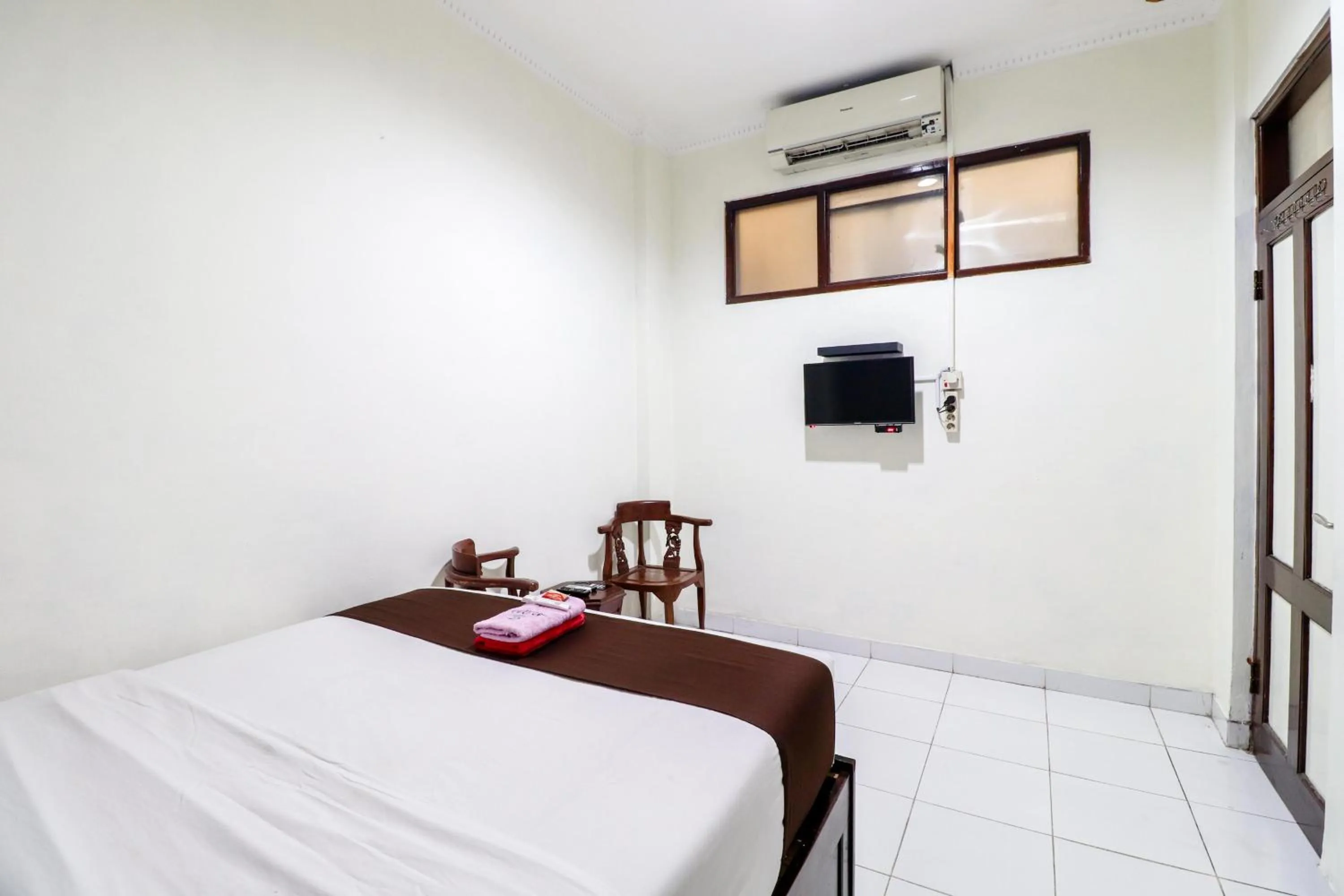 Bed in Hotel Safara Yogyakarta