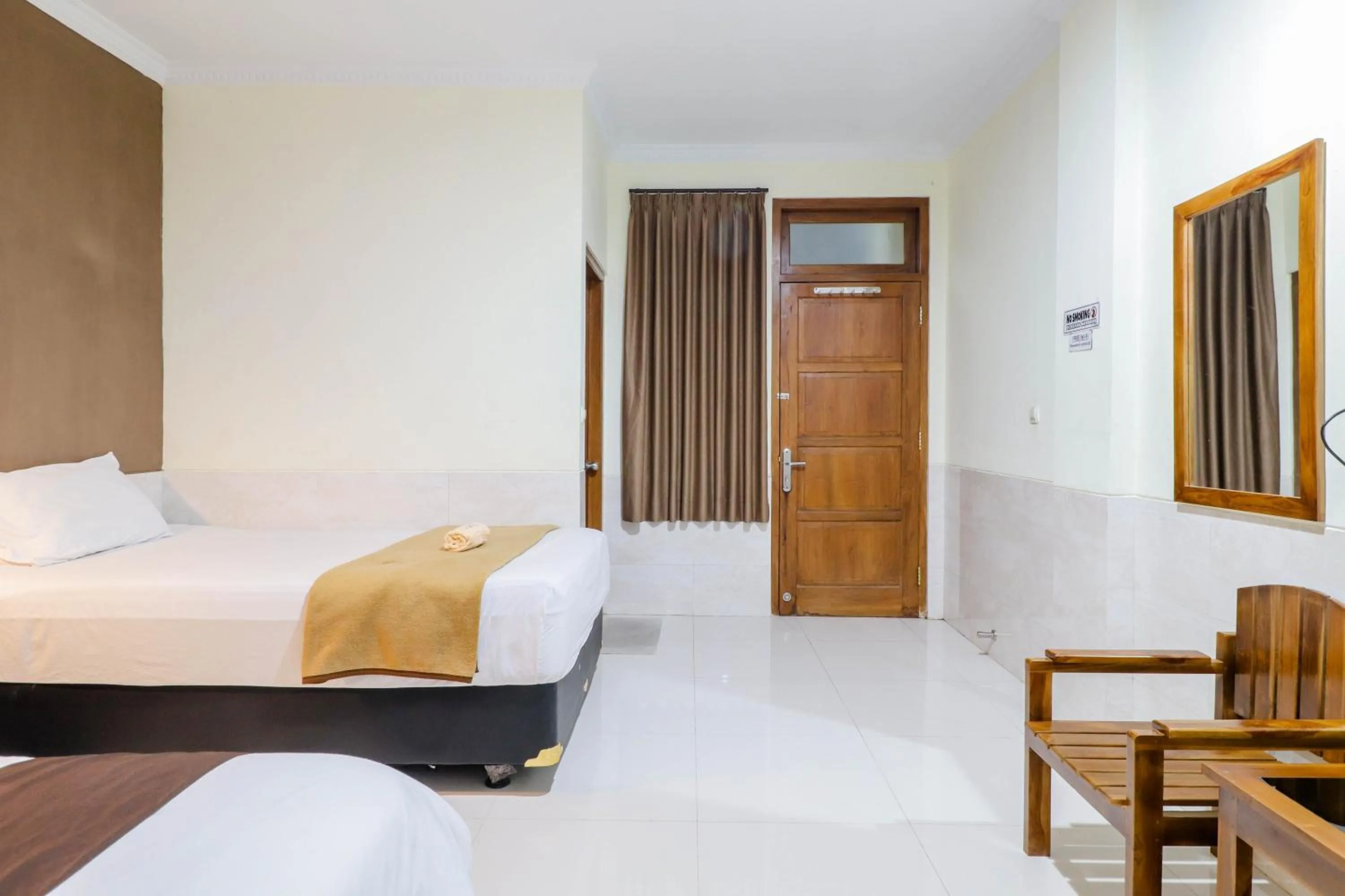 Bed in Hotel Safara Yogyakarta