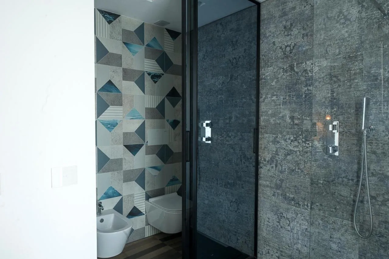 Bathroom in HOTIDAY Olbia Wallure