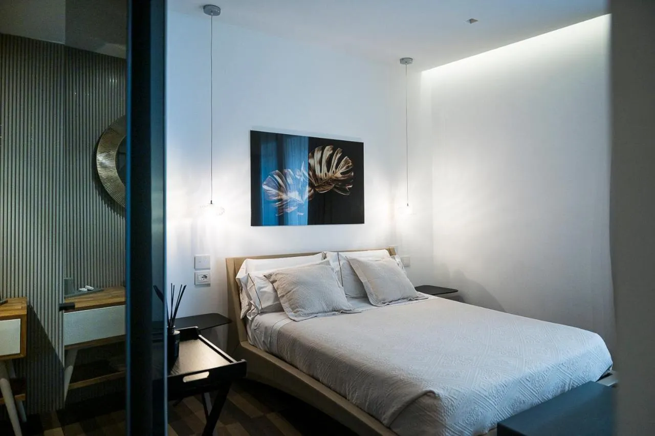 Bed in HOTIDAY Olbia Wallure