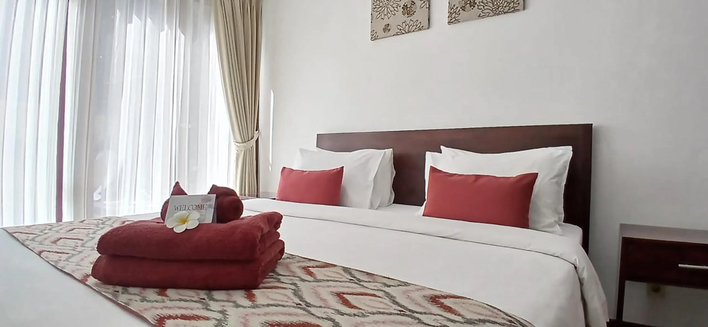 towels, Bed in Sekuta Condo Suites